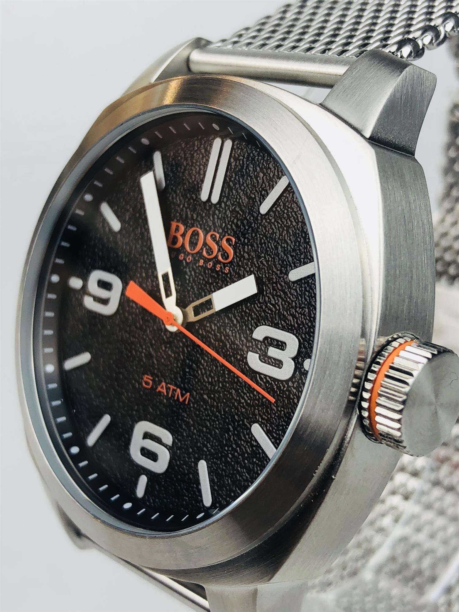 The Watch: Hugo Boss Orange Cape Town Stainless Steel Mesh Strap Stainless Steel Case Men’s Watch 1550013In a homage to the mountainous city from which it takes its name, this Hugo Boss Orange Cape Town Stainless Steel Men’s Watch (1550013) features a confident stainless steel mesh bracelet and case, with a sleek and contemporary dial design ensuring this sense of adventure is underpinned by the Hugo Boss design ethos. Key Features:Quartz MovementBlack DialStainless Steel Mesh BraceletWater Resistant t
