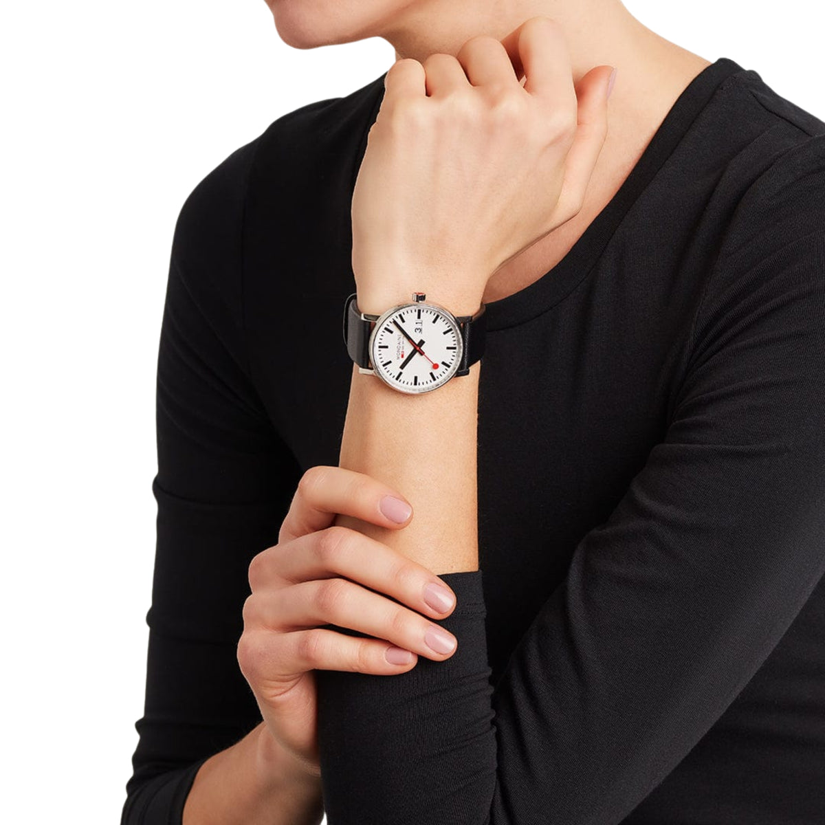 Mondaine Evo2 MSE.40210.LBV minimalist wrist watch on a woman wearing a black long-sleeve top