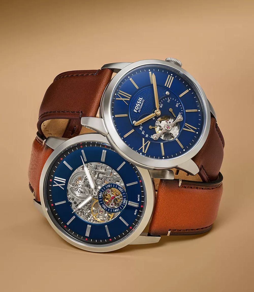 Fossil Townsman mens automatic watches featuring blue open-heart dials and brown leather straps