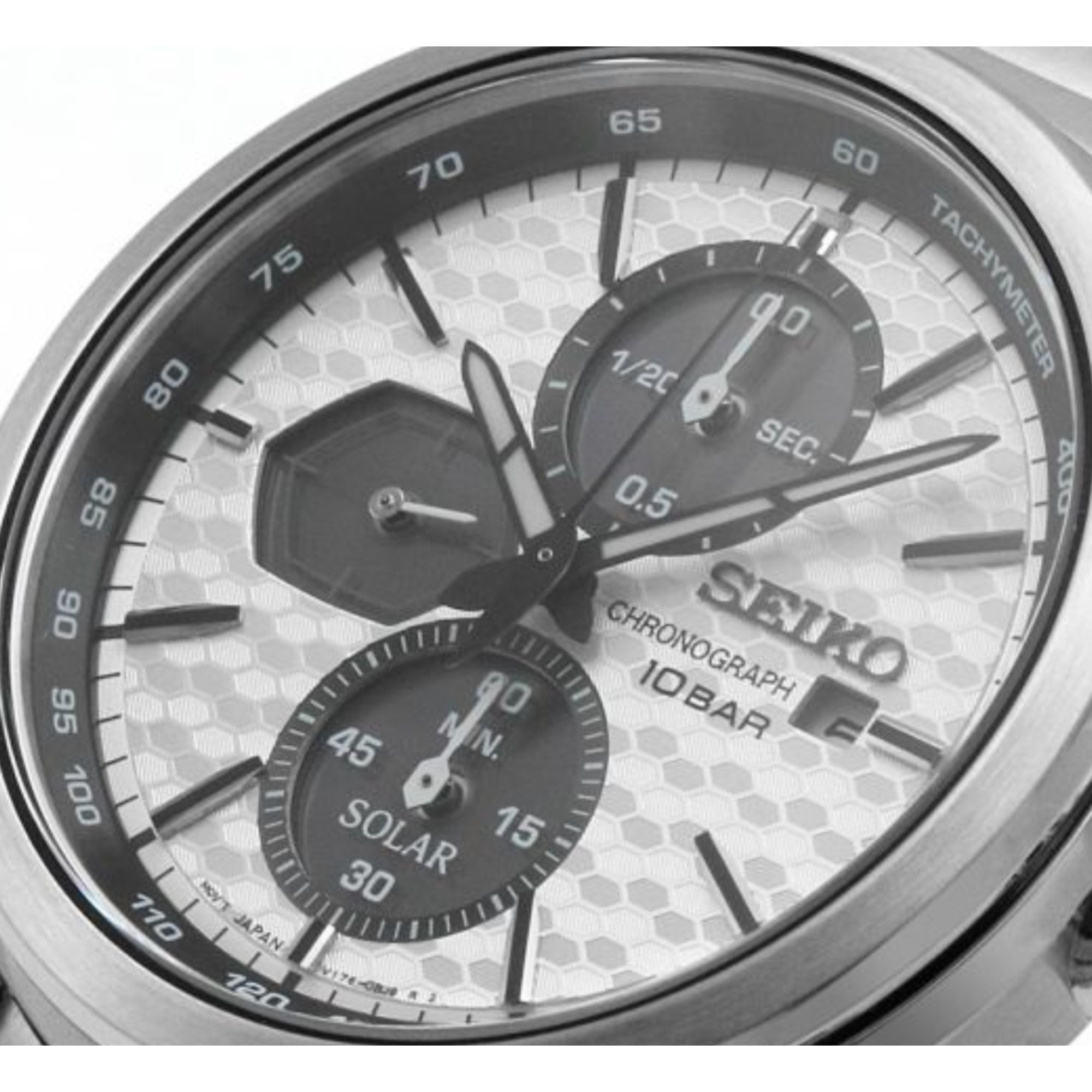 Seiko SSC769P1 white textured dial with black tachymeter ring and solar subdials close-up