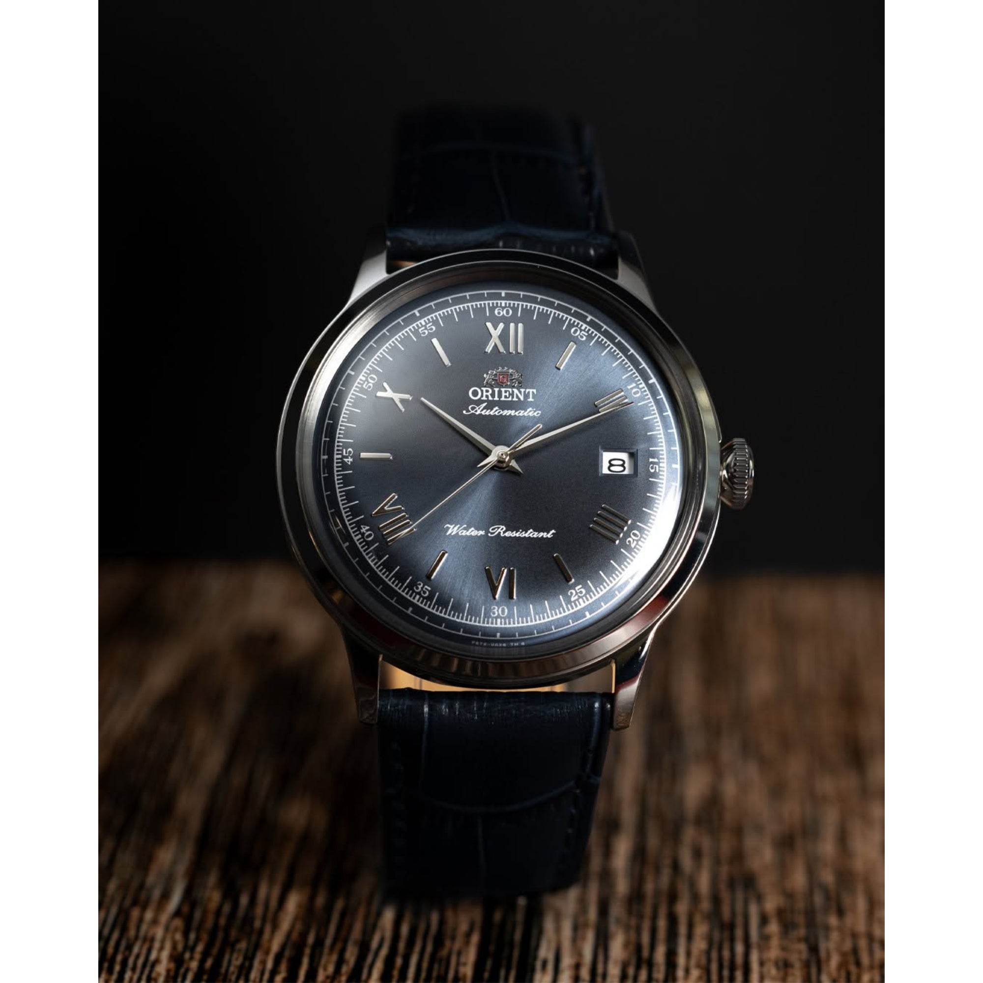 Orient Bambino RA-AC0024L30B navy blue dial with date display close-up