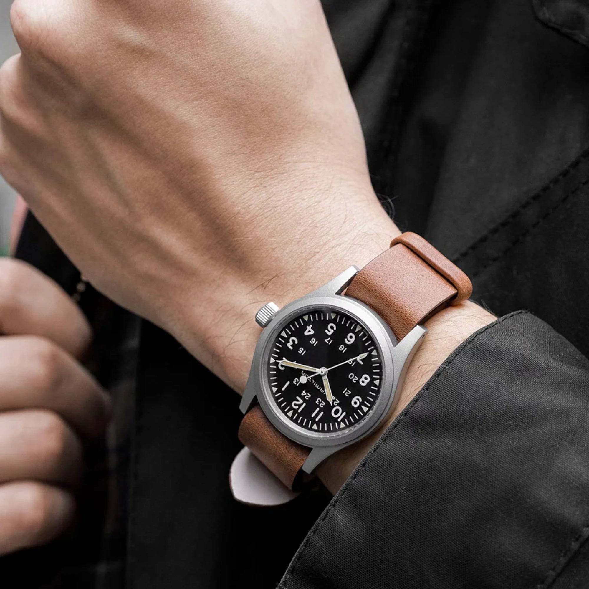 Hamilton Khaki Field 38mm black dial leather mechanical watch worn on wrist