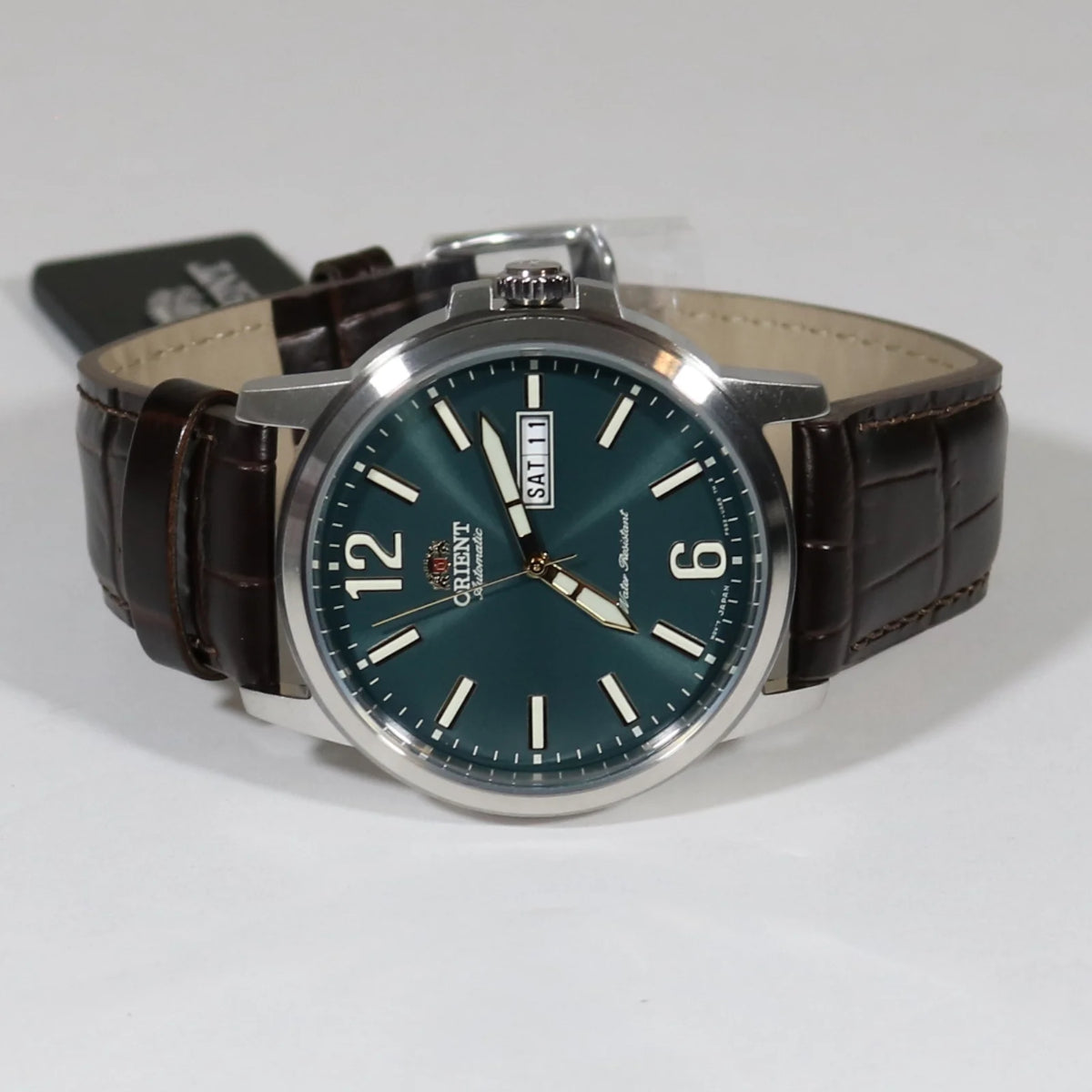 Orient RA-AA0C06E39B green dial with day and date display close-up