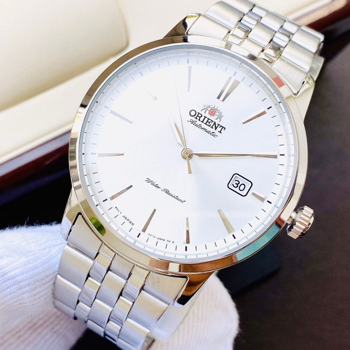 Orient Contemporary automatic watch with a white dial and stainless steel bracelet