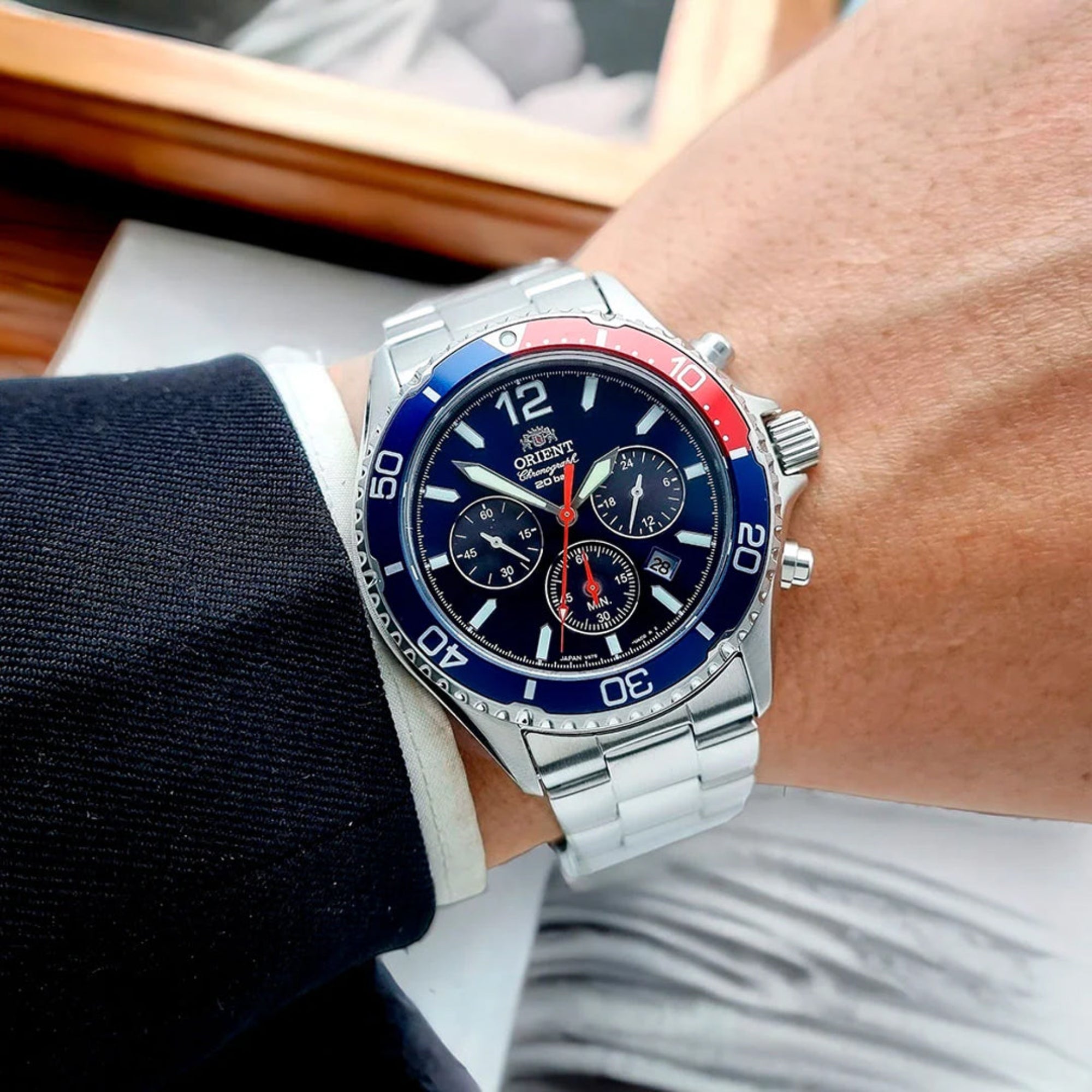 Orient Mako RA-TX0201L10B solar chronograph watch worn on wrist