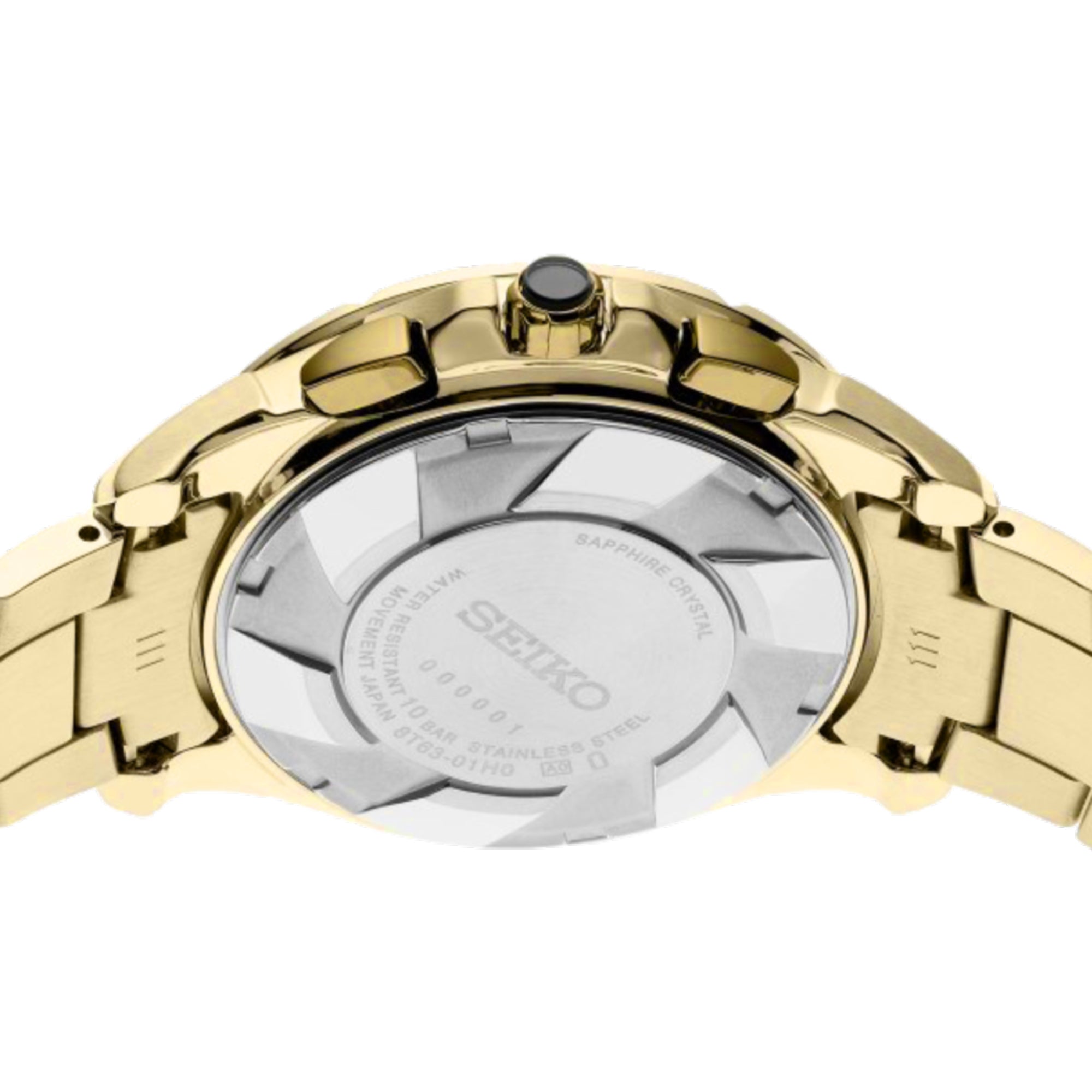 Gold Seiko watch back on a white background