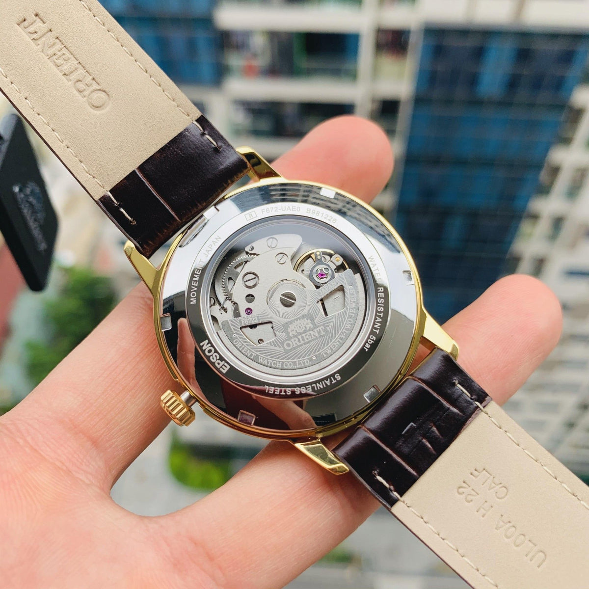 Exhibition caseback and leather strap of an Orient Symphony RA-AC0F04S30B automatic watch
