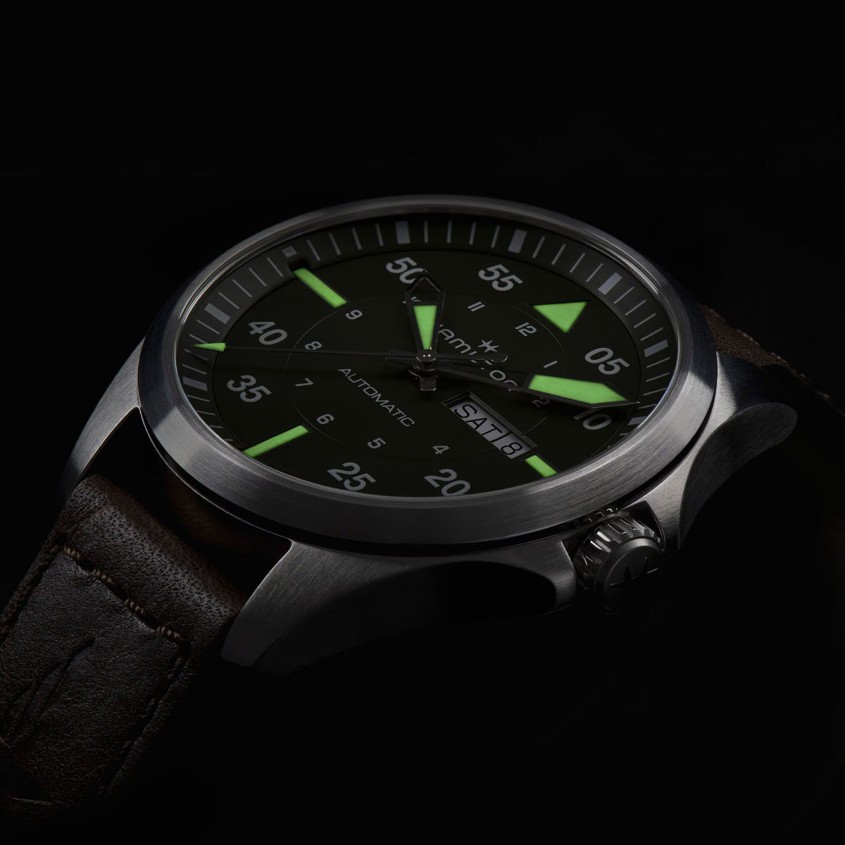 Hamilton Khaki Aviation green dial H64635560 automatic watch at dark