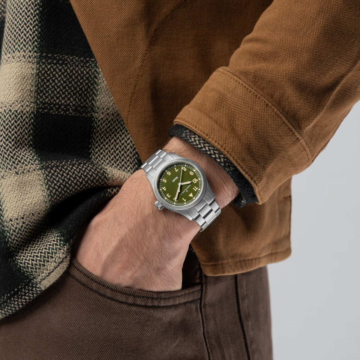 Hamilton Khaki Field 38mm green dial quartz watch worn on wrist H69401160