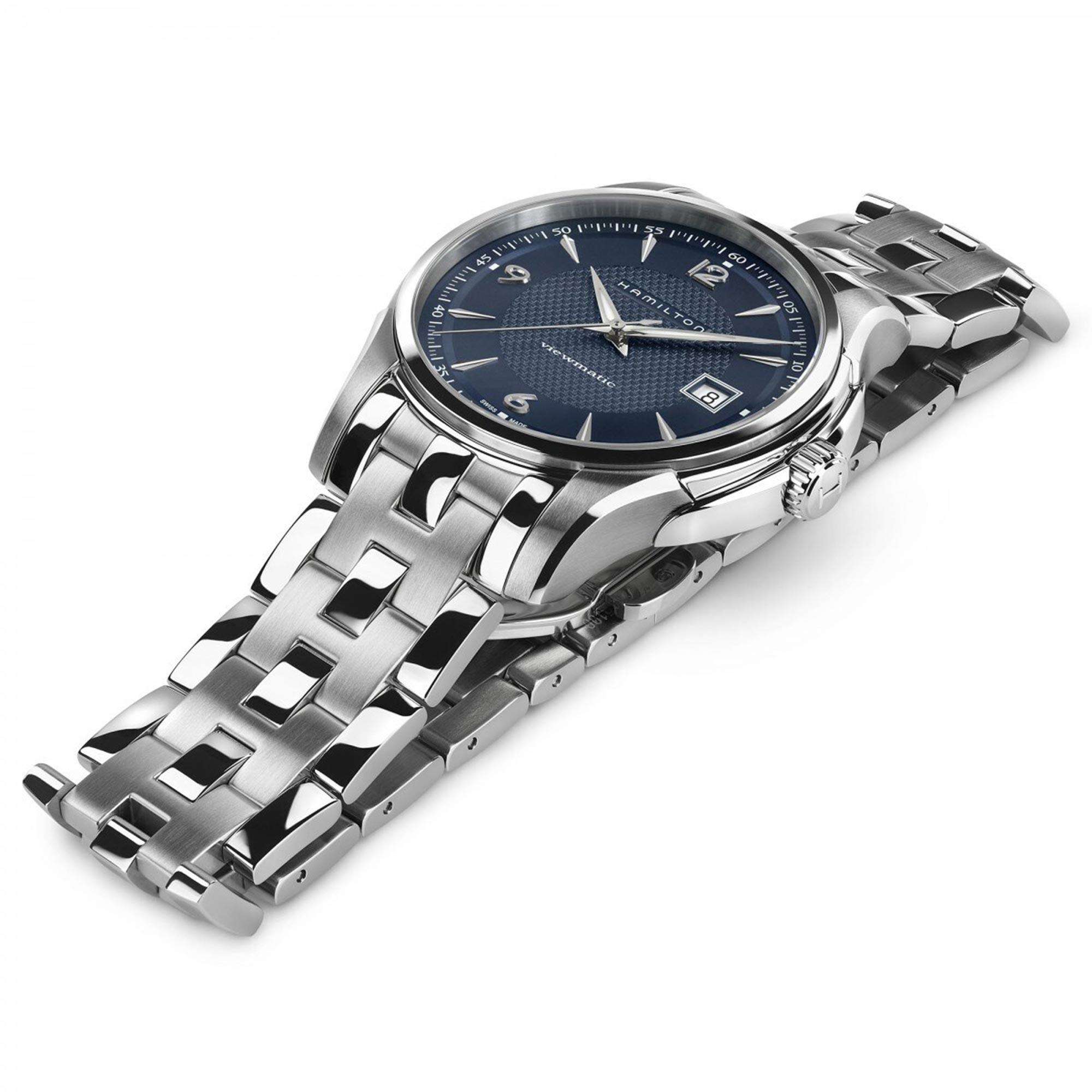 Silver watch with a blue face on a white background