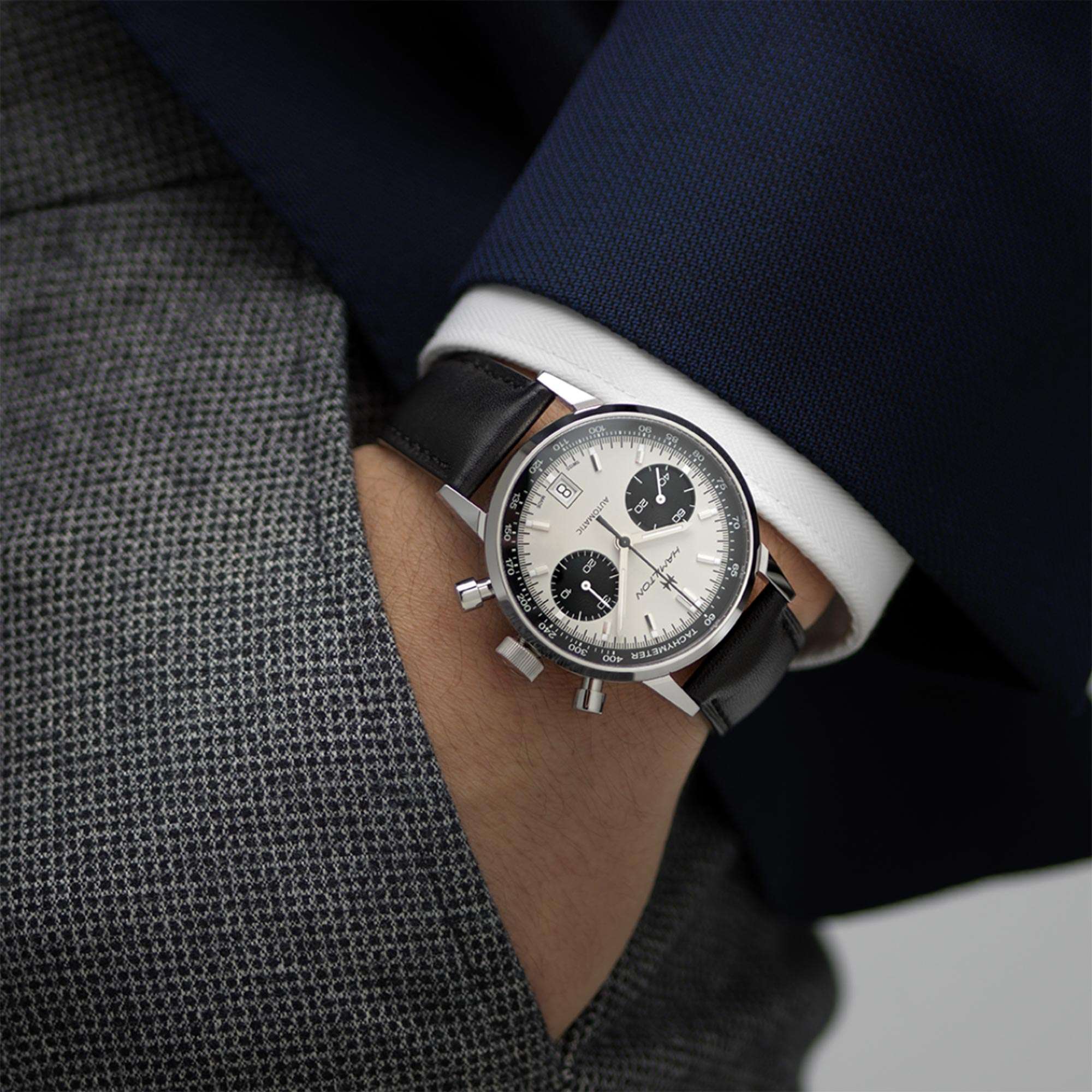 Hamilton American Classic chronograph white dial and leather strap watch H38416711 on wrist with formal suit