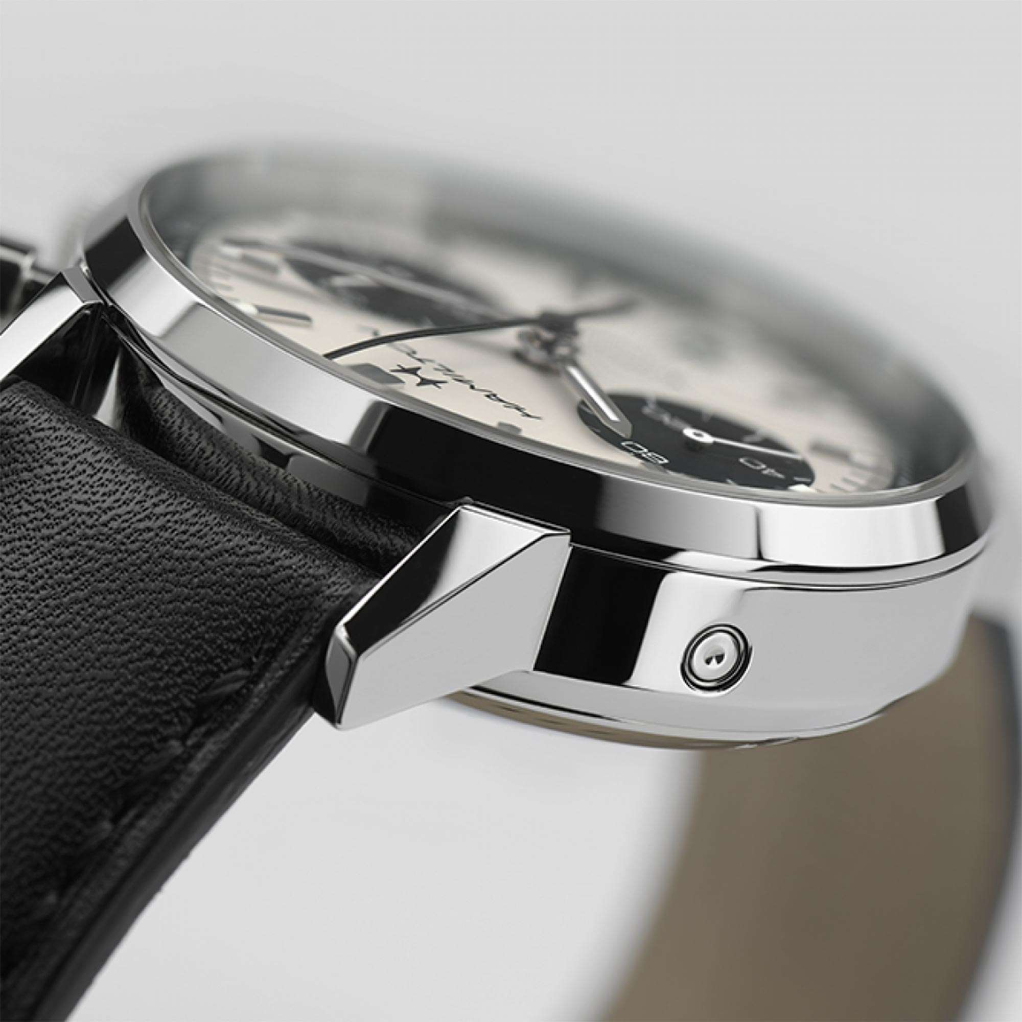 Close-up of Hamilton American Classic chronograph stainless steel case and black leather strap