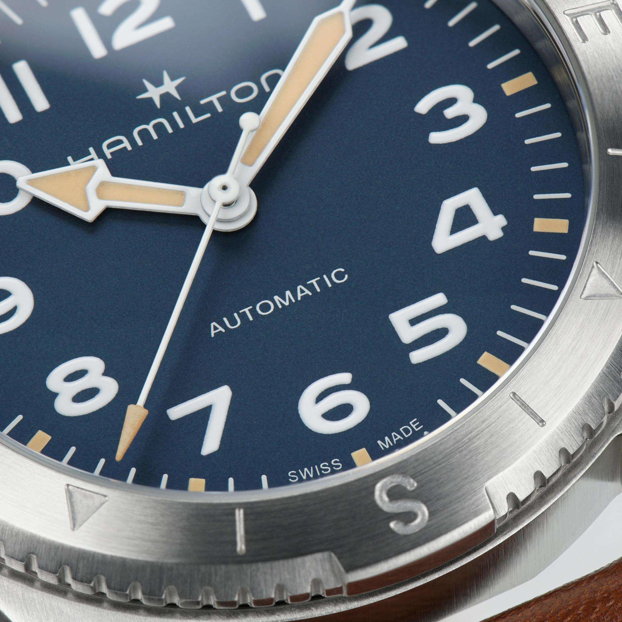 Hamilton H70225540 blue textured dial with Super-LumiNova hands and Arabic numerals close-up