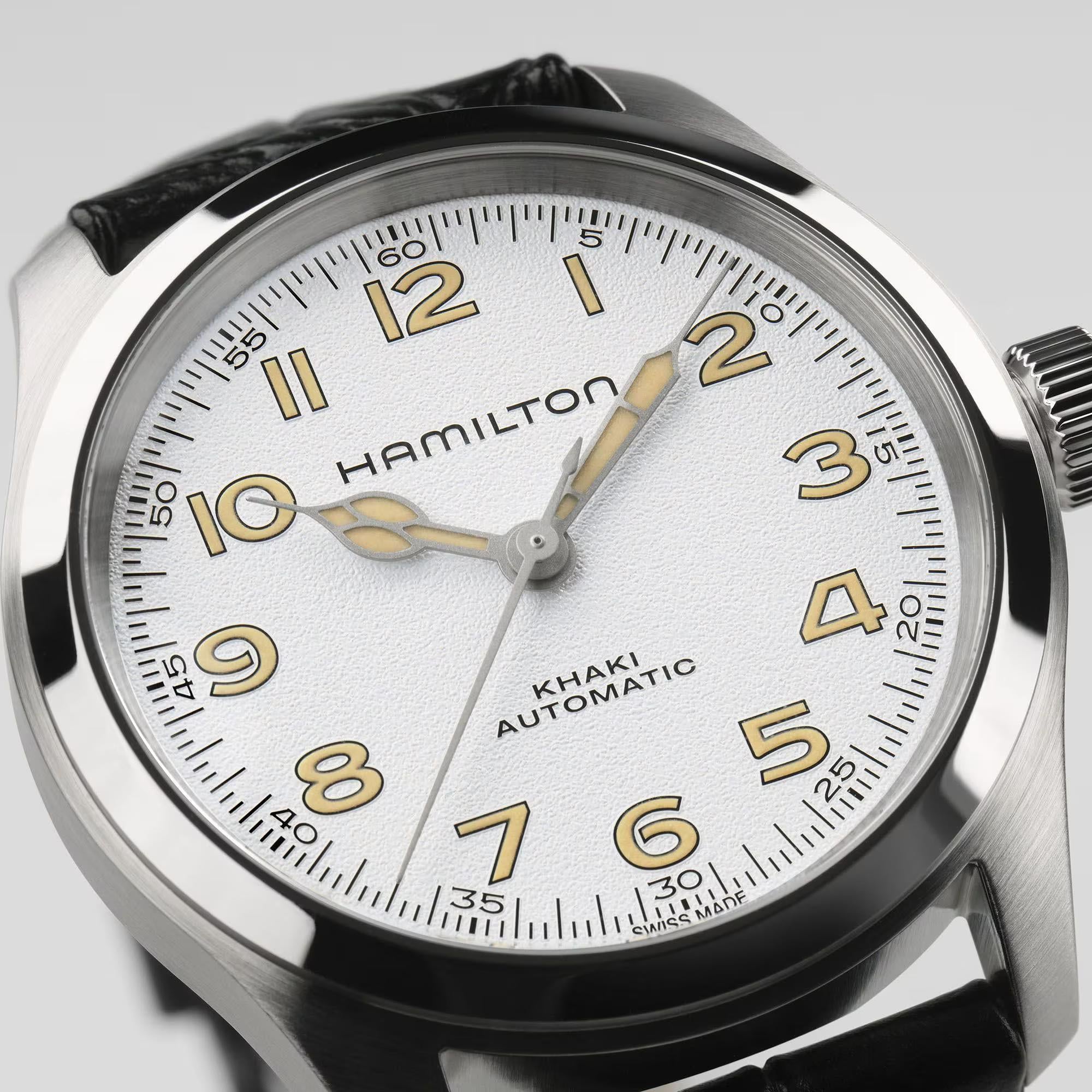 Hamilton H70405710 antique-white grained dial with cathedral hands and Arabic numerals close-up