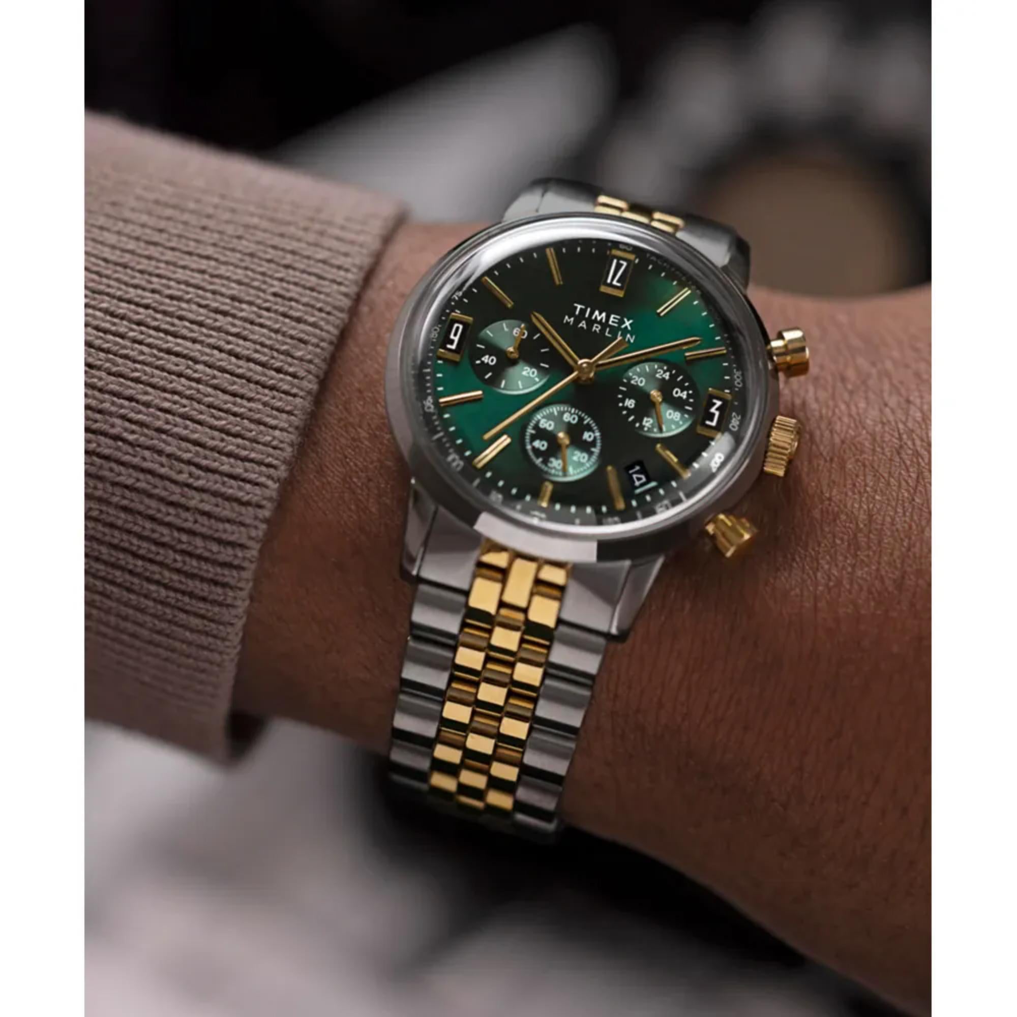 Timex Marlin TW2W60000 green sunray dial with three subdials and date display on-wrist view