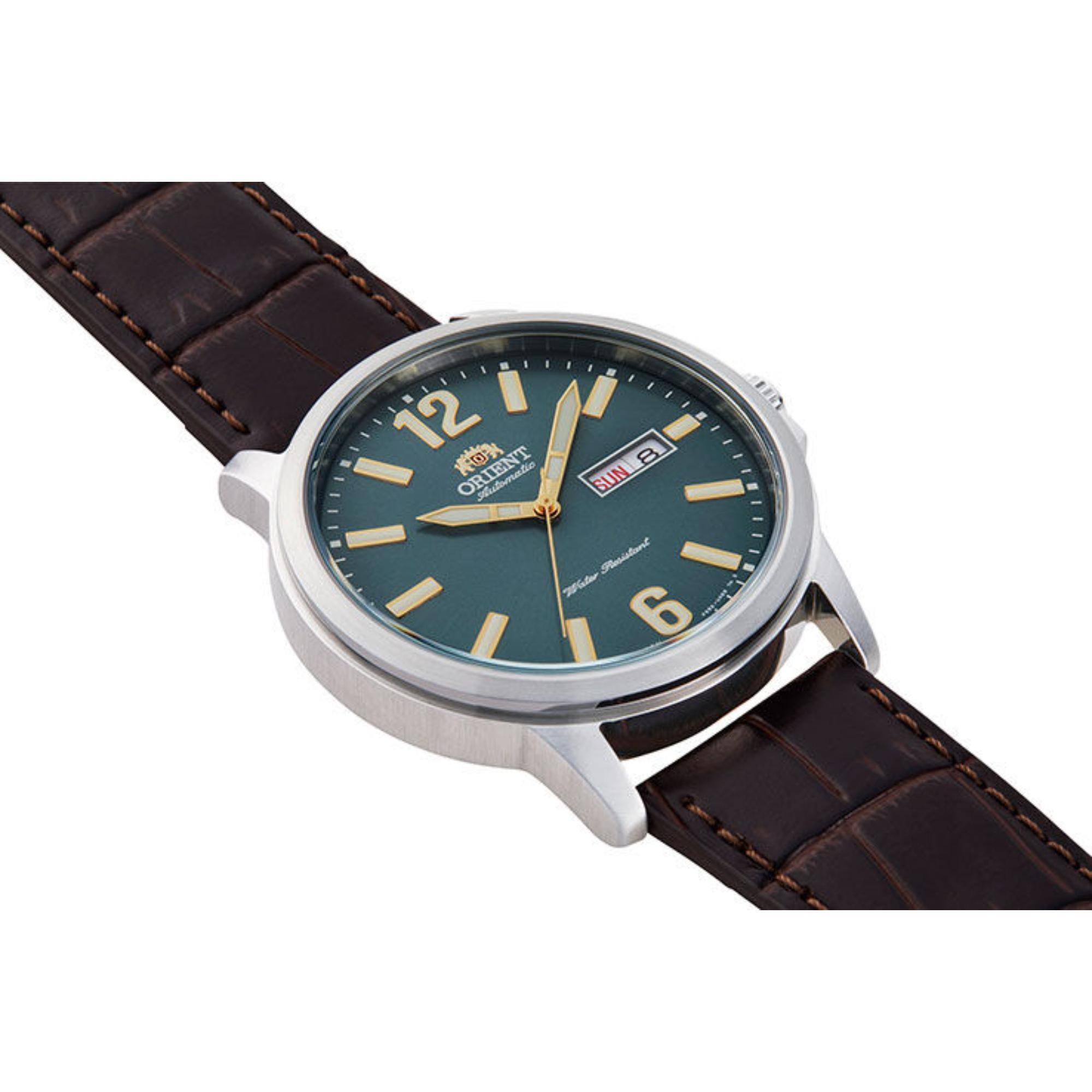 Orient Contemporary automatic watch with a green dial and brown leather strap.