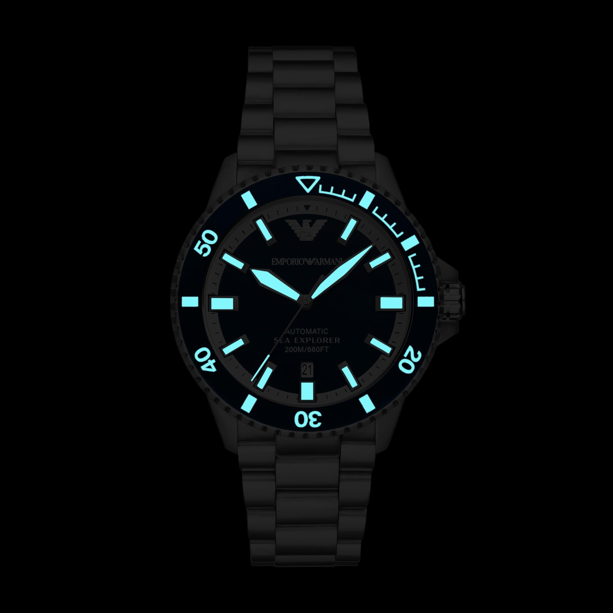 Black watch with blue glowing face on a black background