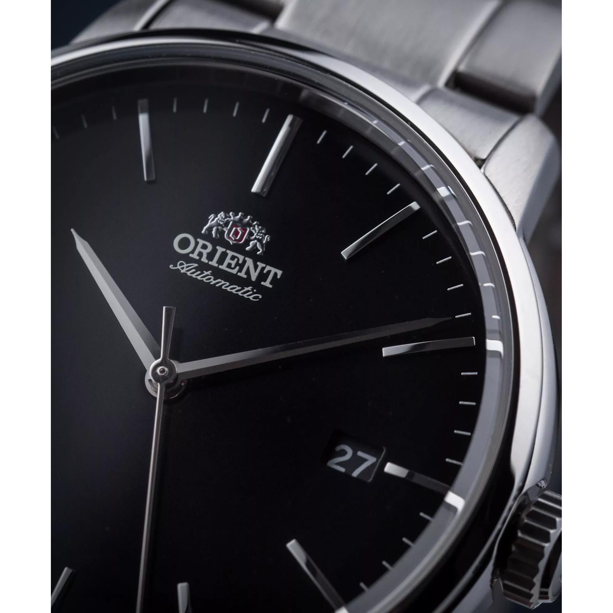 Orient RA-AC0E01B30B black dial with silver-tone stick indices and date display close-up