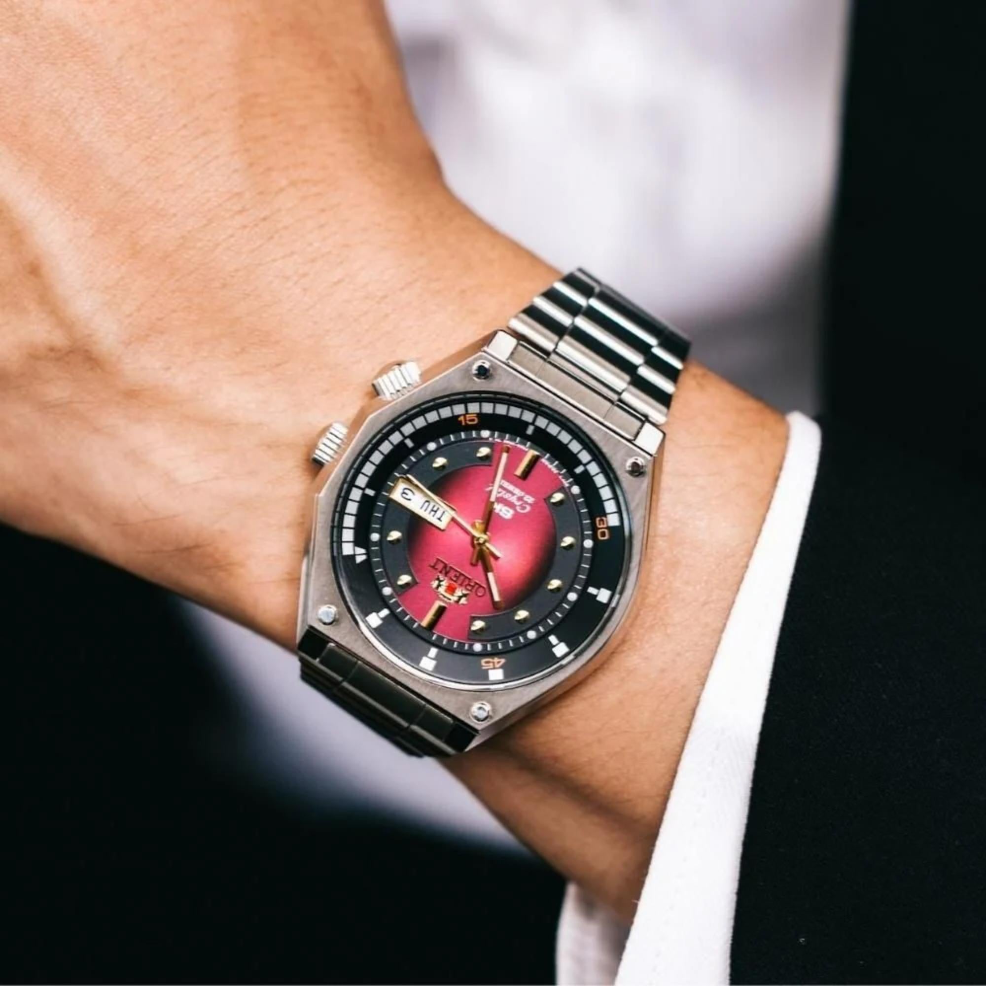 Orient Neo 70s 42mm red dial automatic watch worn on wrist
