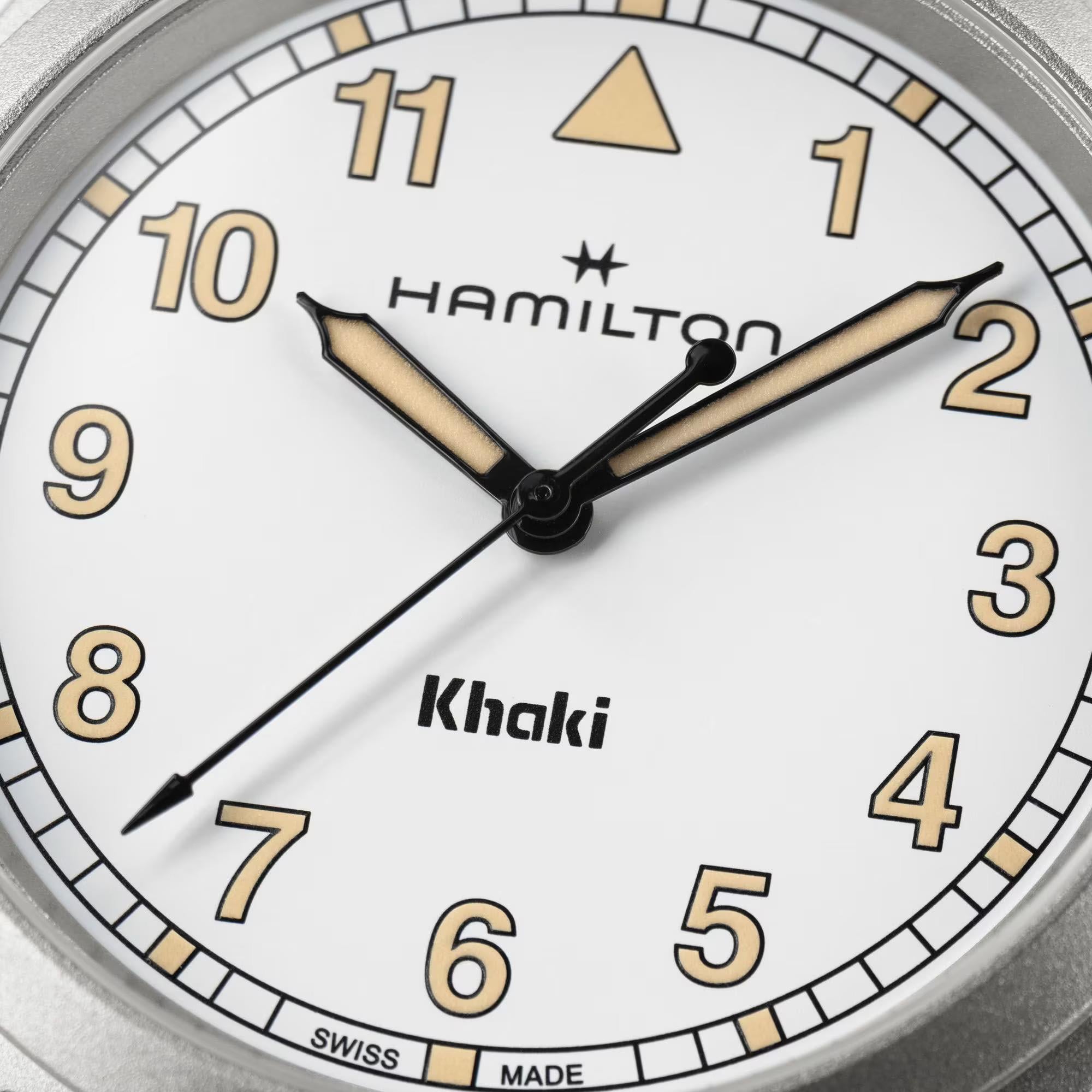 Hamilton Khaki Field H69401110 white dial with bold Arabic numerals and luminous hands close-up