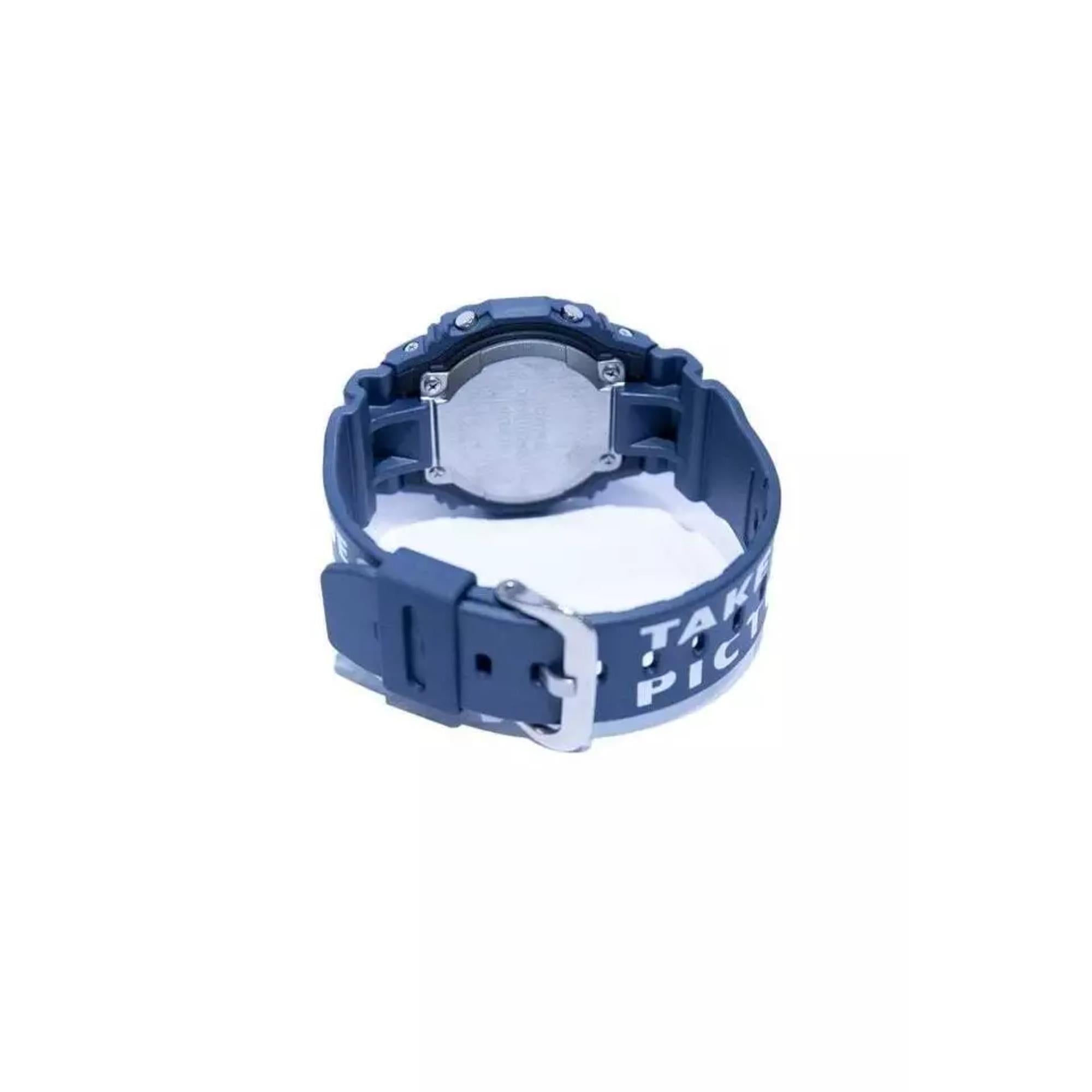 Blue wristwatch with a strap on a white background