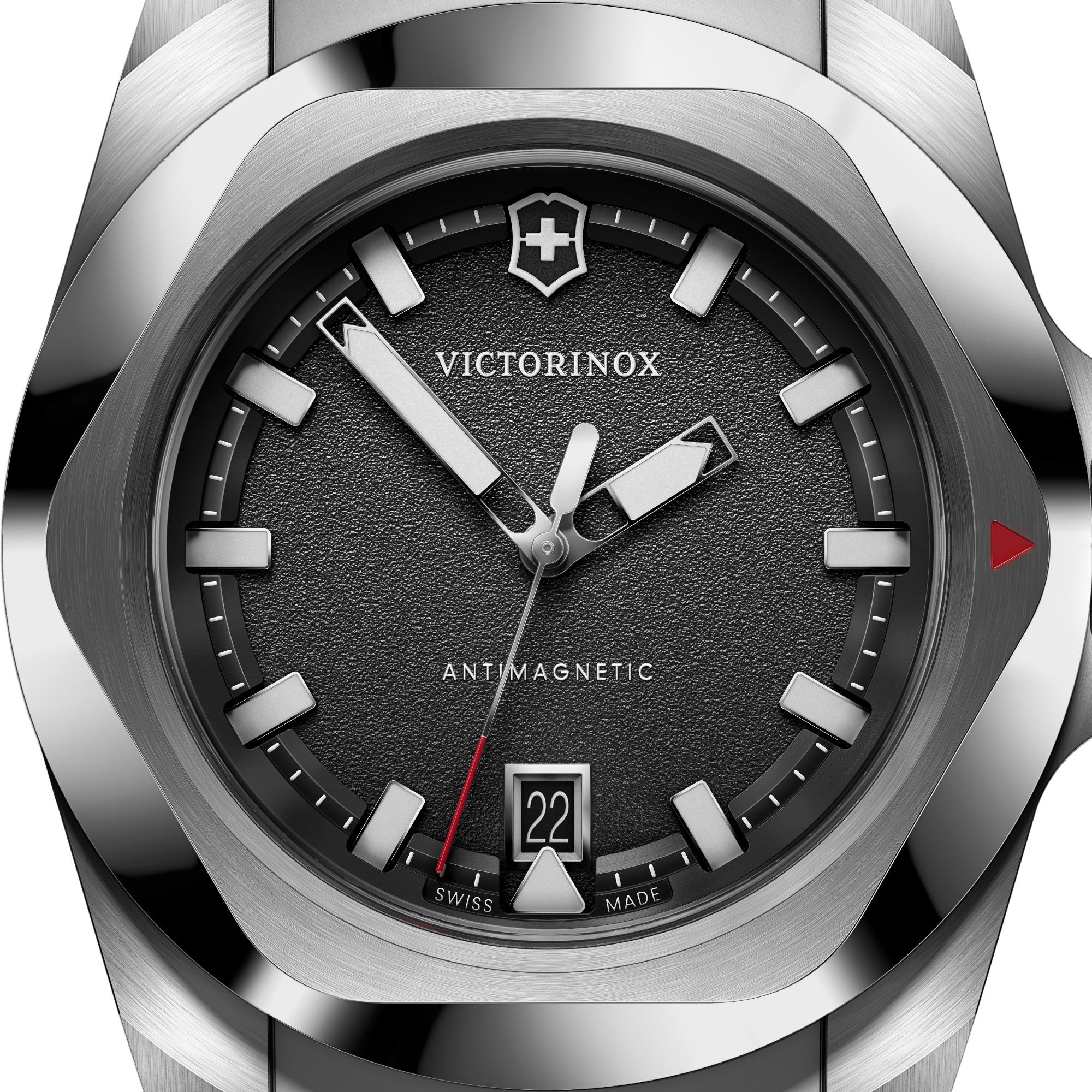 Close-up of Victorinox I.N.O.X. 242028 matte black dial and date display at six o clock
