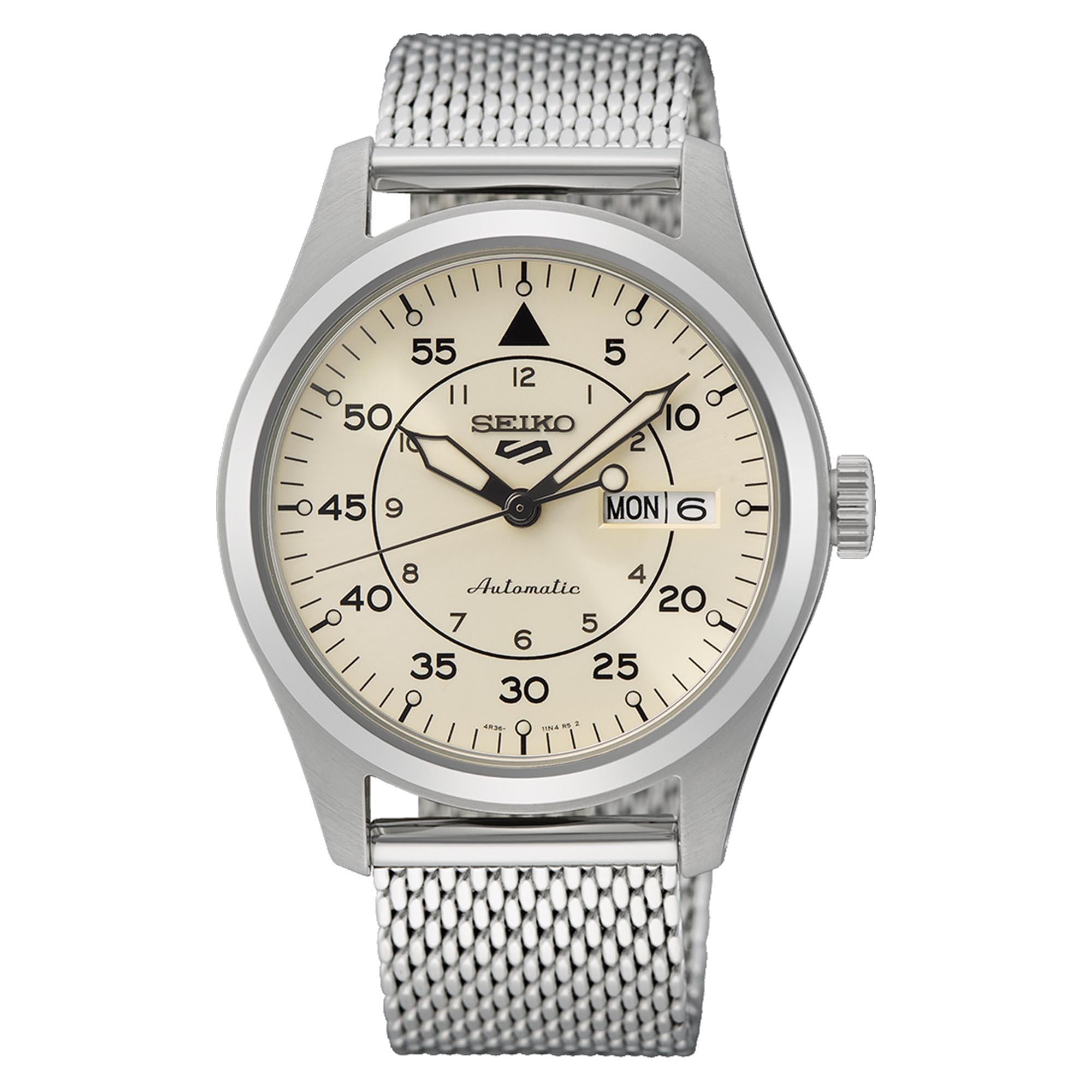Silver Seiko watch with a beige face on a white background