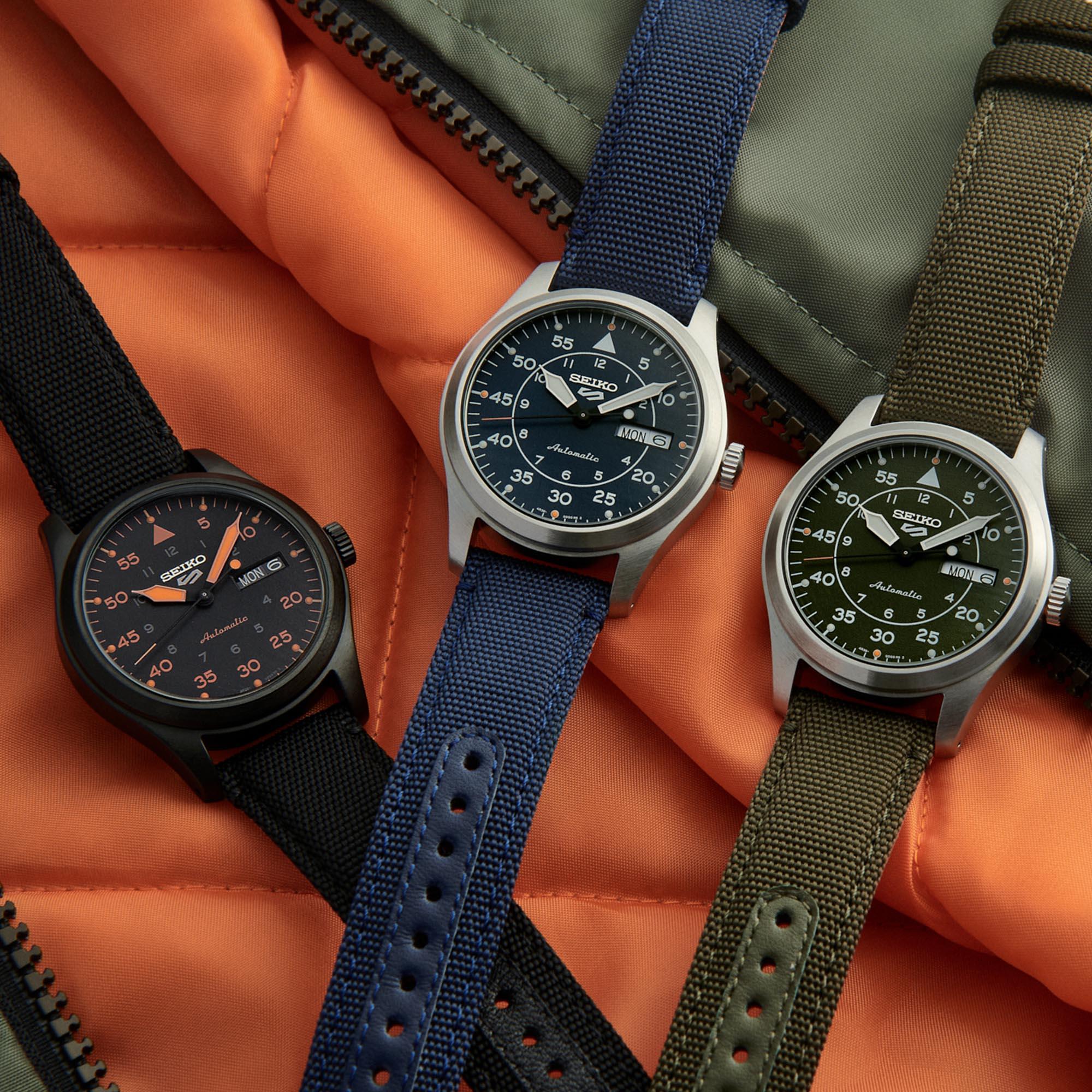 Seiko 5 Flieger Pilot/Aviation Style Automatik Schwarz und Orange Zifferblatt Canvas Armband Herren Uhr SRPH33K1