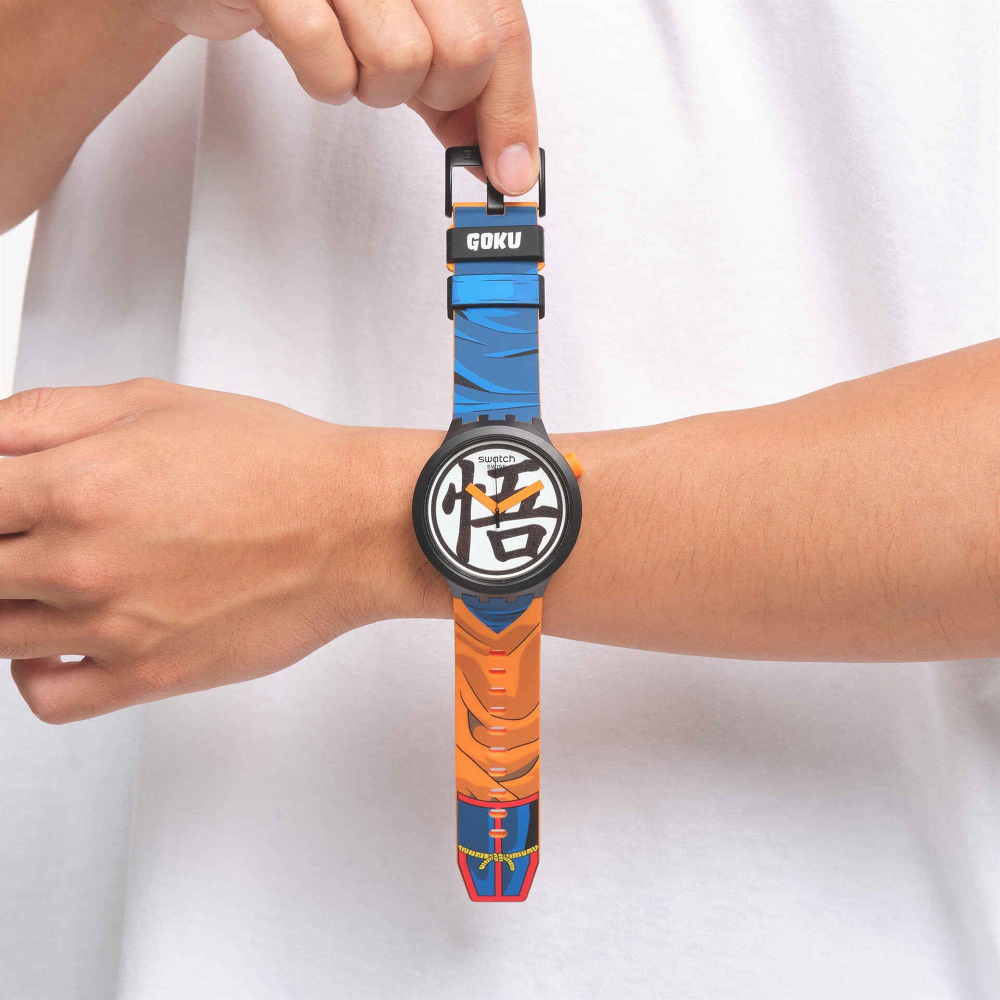 Wristwatch with colorful strap featuring 'Goku' branding on a white background