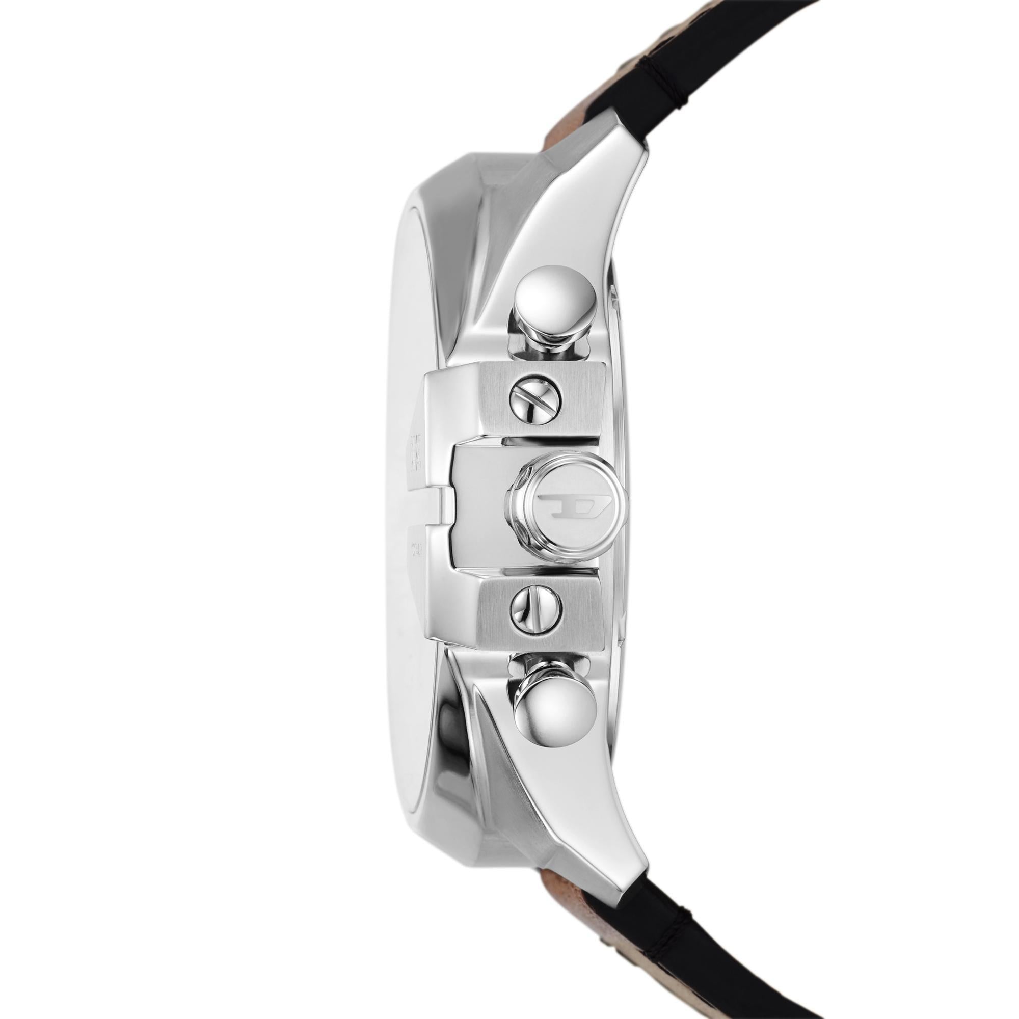 Close-up of a watch with a silver case and black strap on a white background