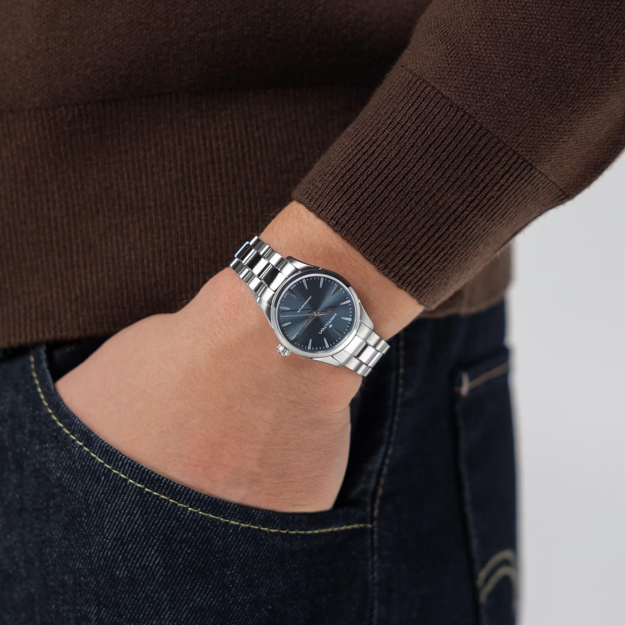 Hamilton Jazzmaster H32301141 watch with a blue dial and stainless steel bracelet on a wrist