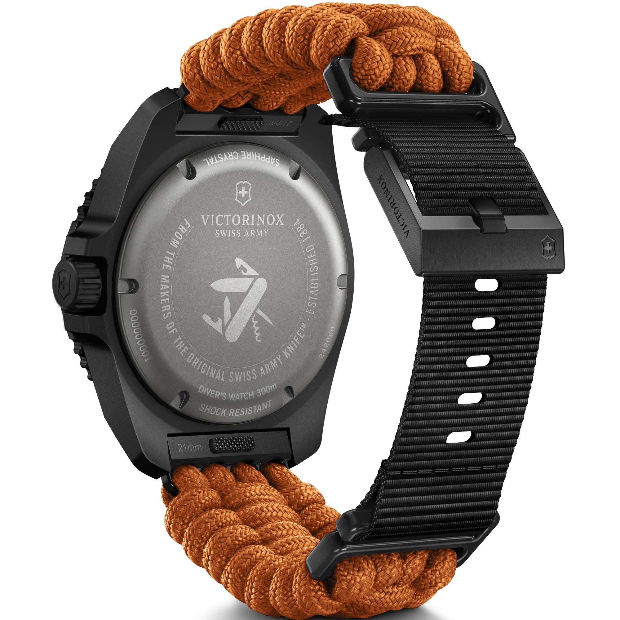 The caseback view of a black Victorinox Dive Pro watch, featuring a solid engraved backing and an orange paracord strap