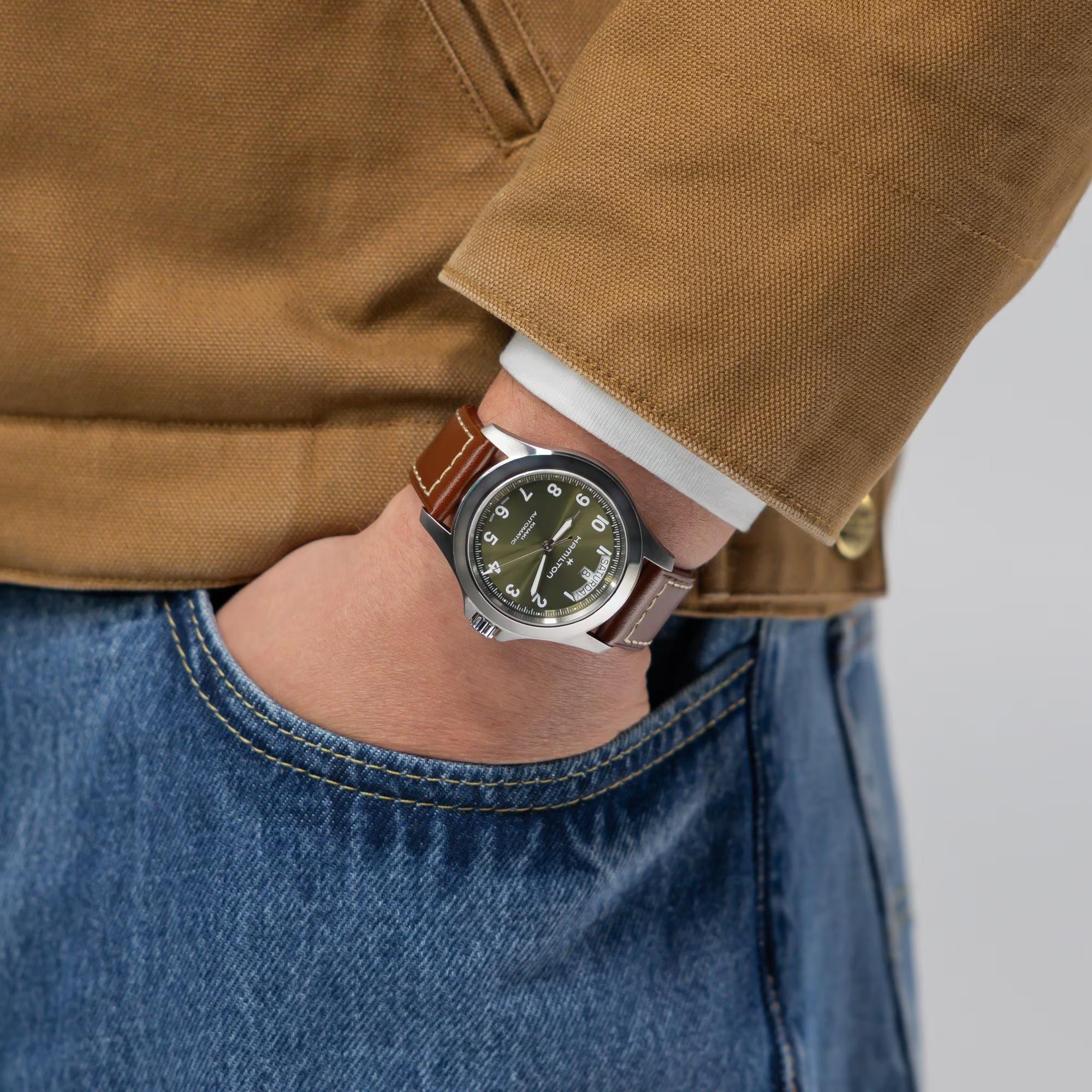 Hamilton Khaki Field King Day Date H64475560 green leather strap watch on wrist