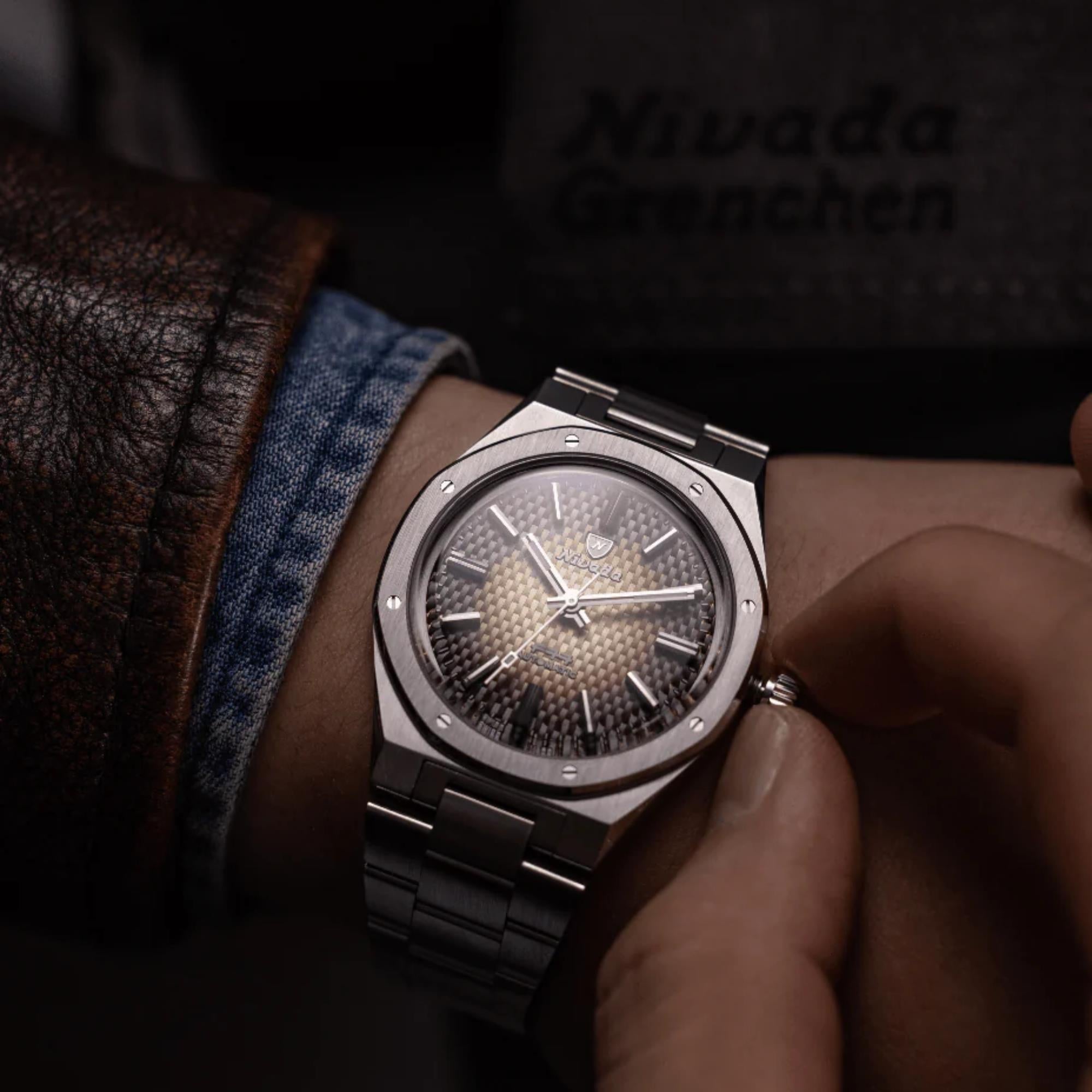 Nivada Grenchen F77 MK1 68002A77 brown smoked dial winding crown view