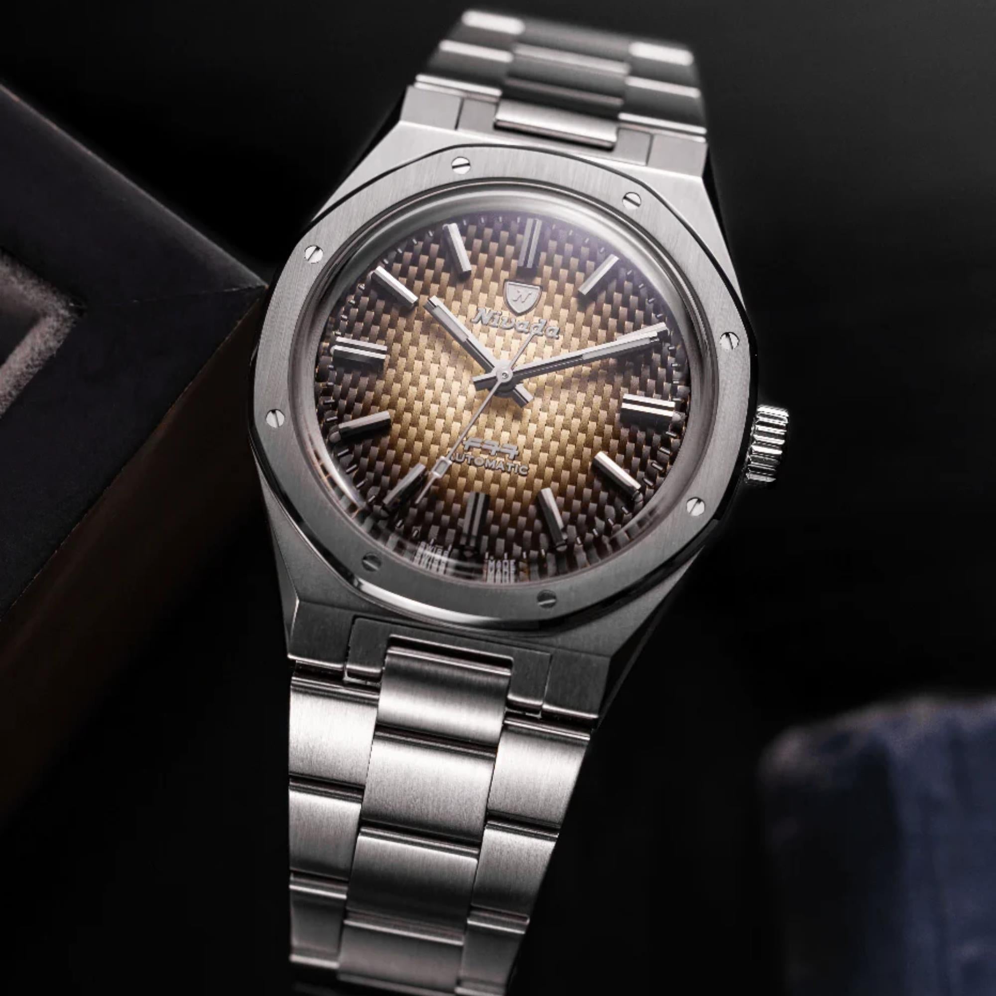 Nivada Grenchen F77 MK1 68002A77 top-down slightly angled display view