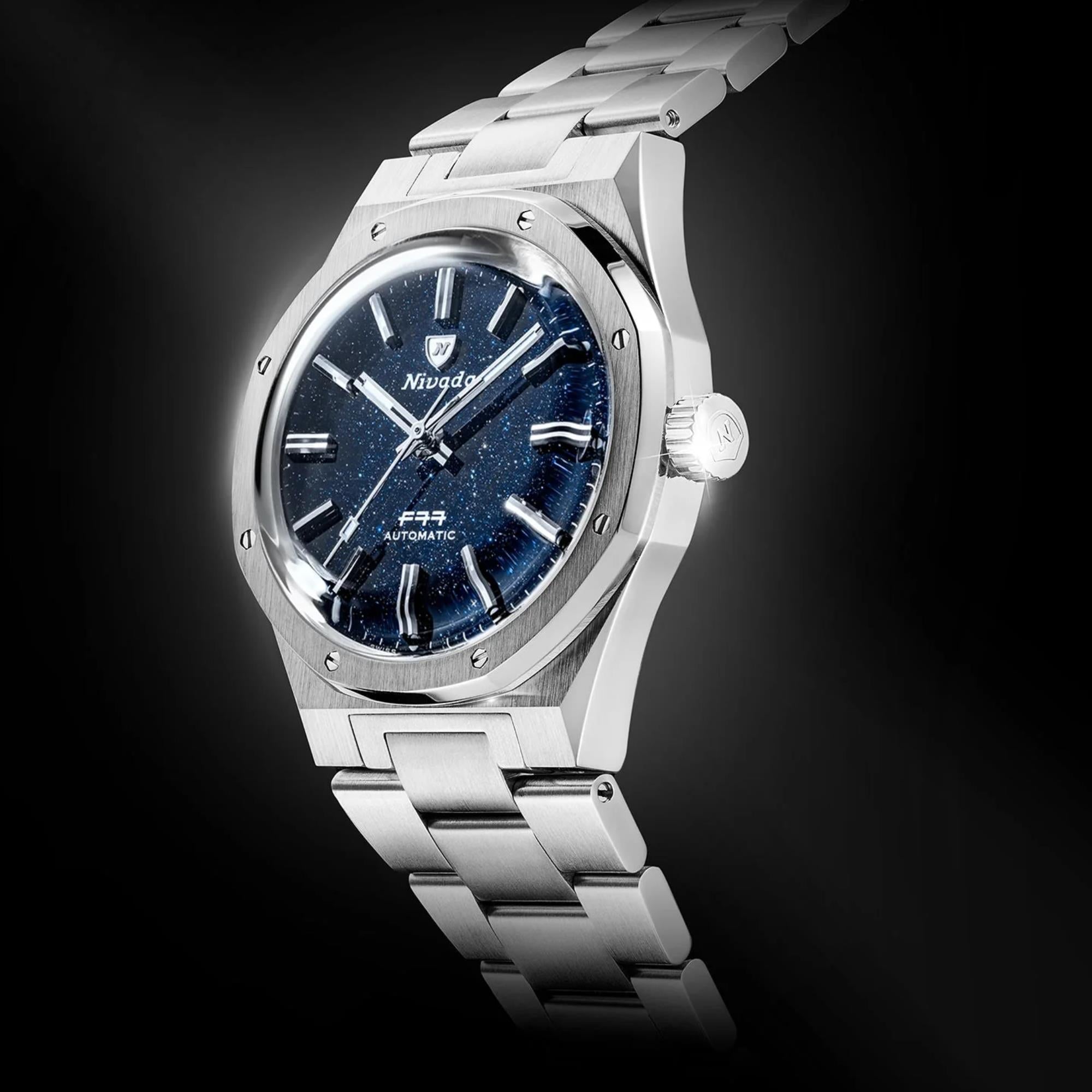Nivada Grenchen F77 MK1 68010A77 dark blue dial three-quarter dramatic lighting view