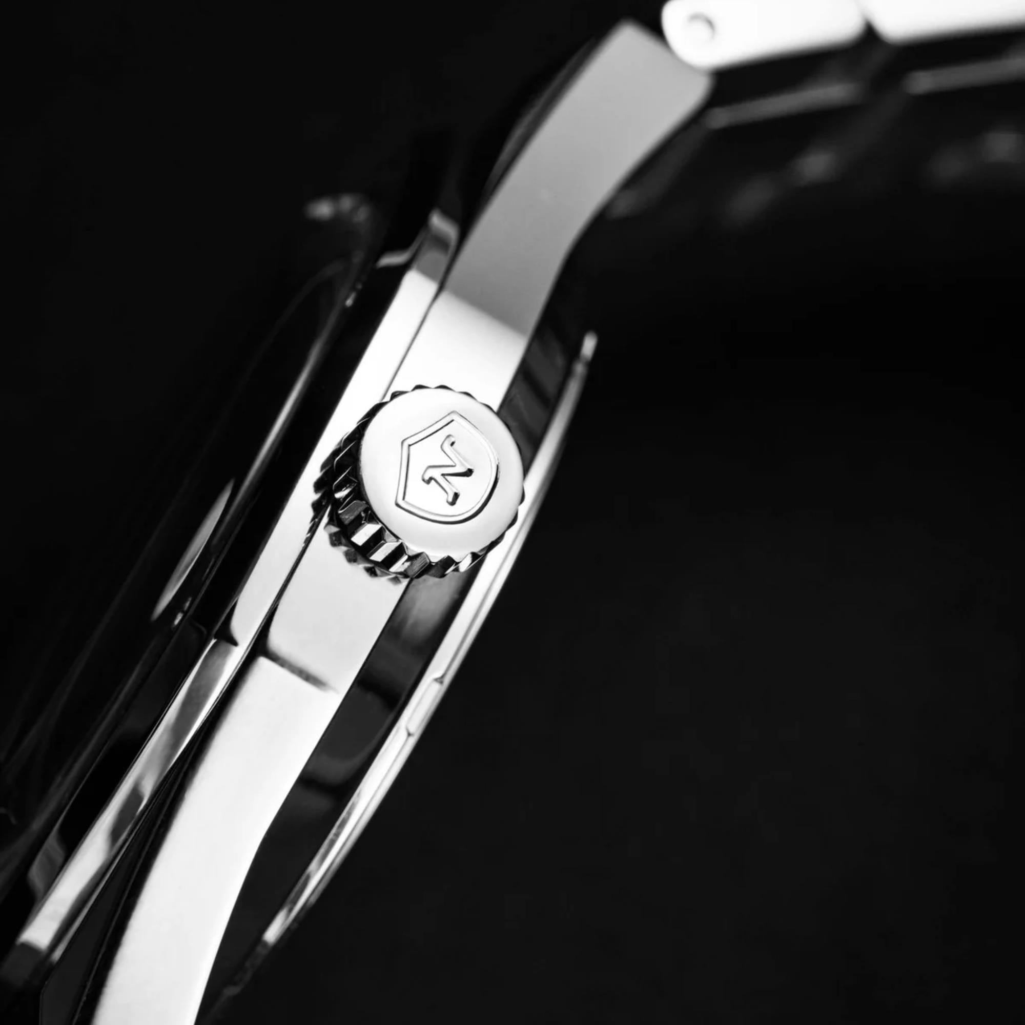 Nivada Grenchen F77 MK1 68010A77 signed crown close up macro view