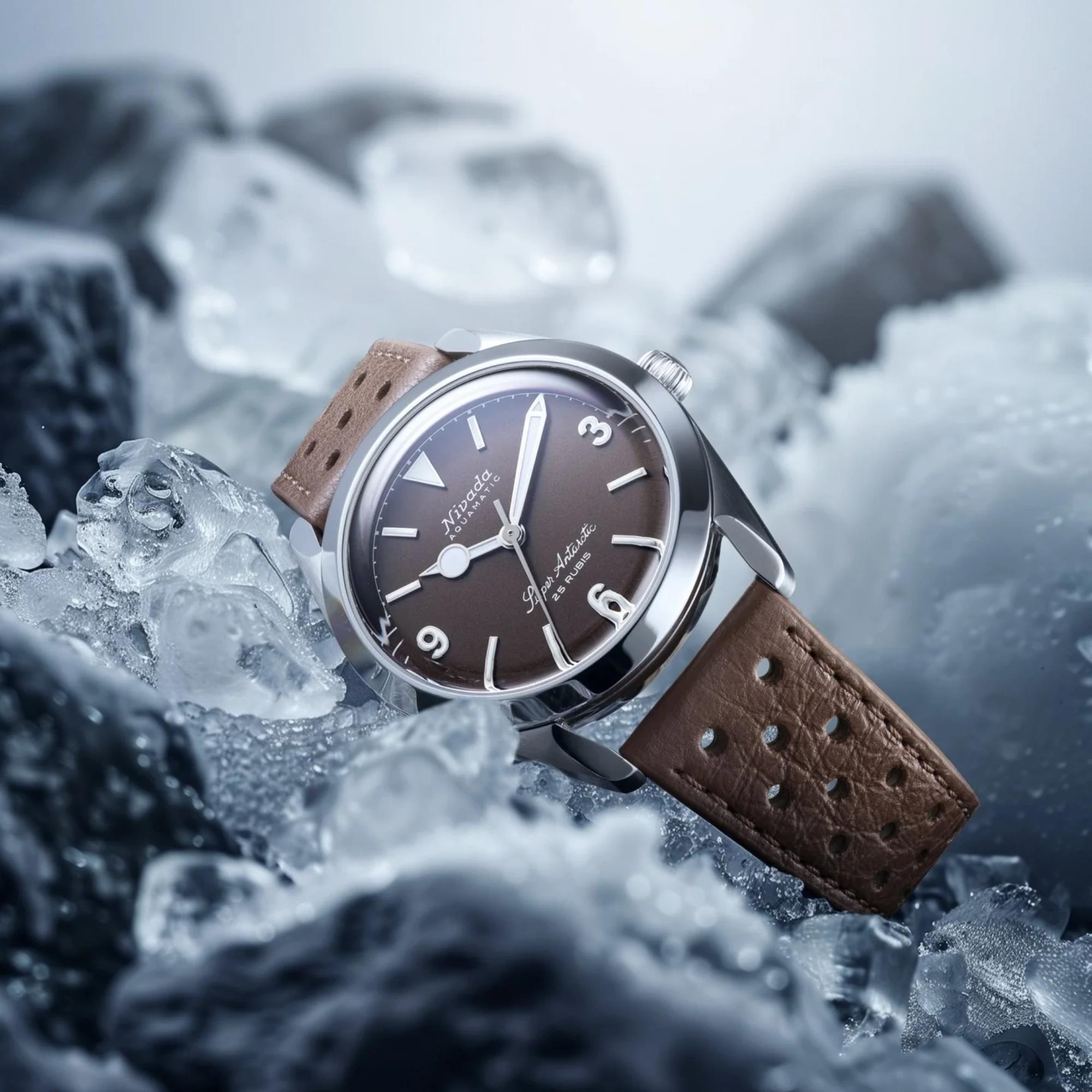 Nivada Grenchen Super Antarctic 32040A23 automatic watch resting on ice blocks