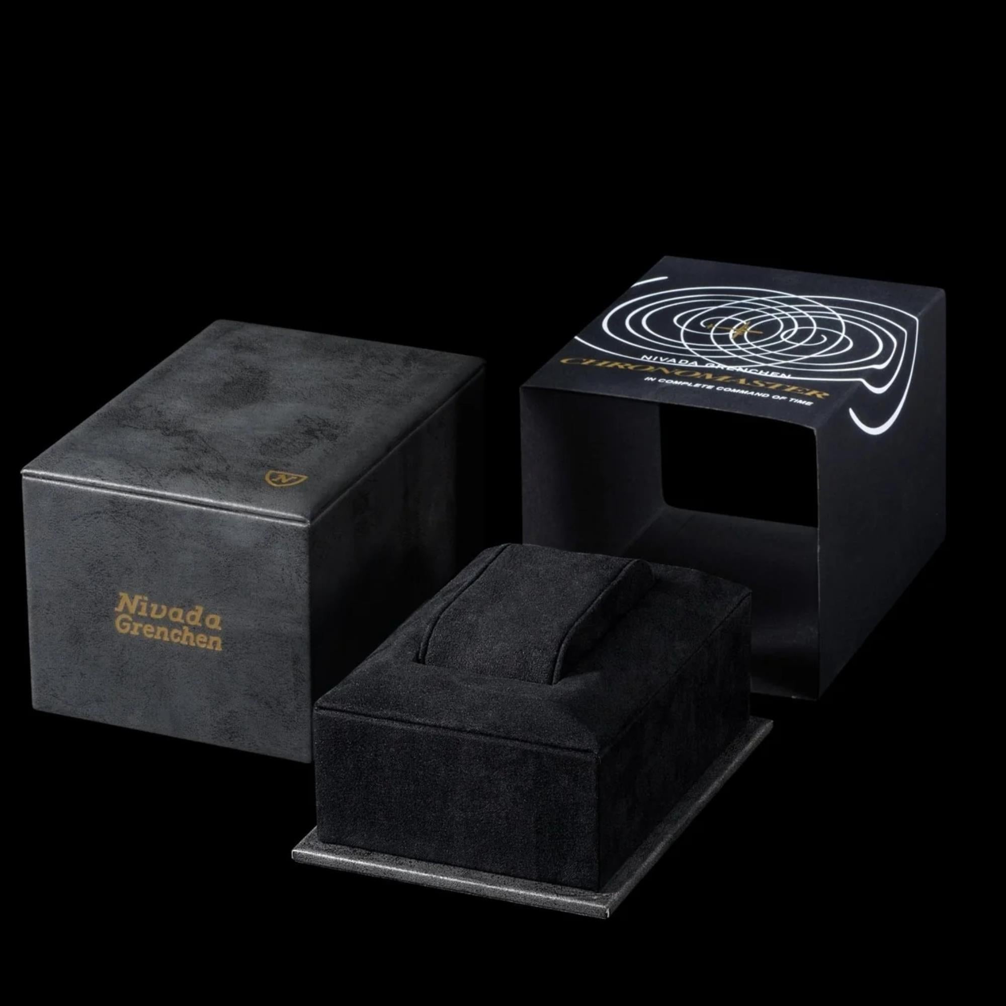 Nivada Grenchen Chronomaster 86011WM01 black watch box, outer sleeve, and black display cushion arrangement