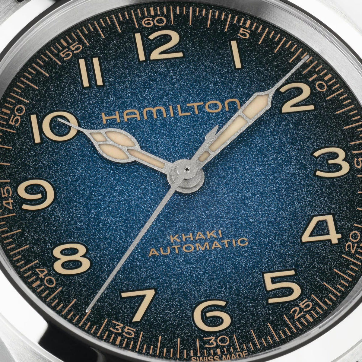 Hamilton Khaki Field Murph H70405740 Swiss automatic watch dial macro shot highlighting textured blue gradient, cathedral hands, and hour indices