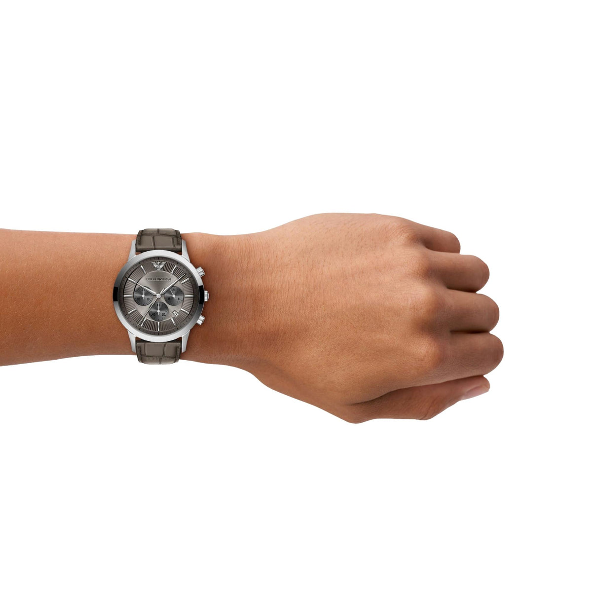 Emporio Armani Archetipo AR11821 timepiece worn on a wrist, showing the grey dial, stainless steel casing, and alligator-embossed brown leather strap