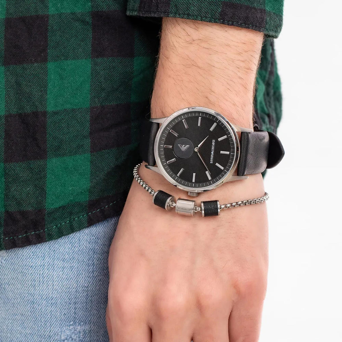 Emporio Armani Renato AR80039 wrist shot displaying black dial timepiece paired with steel wristlet