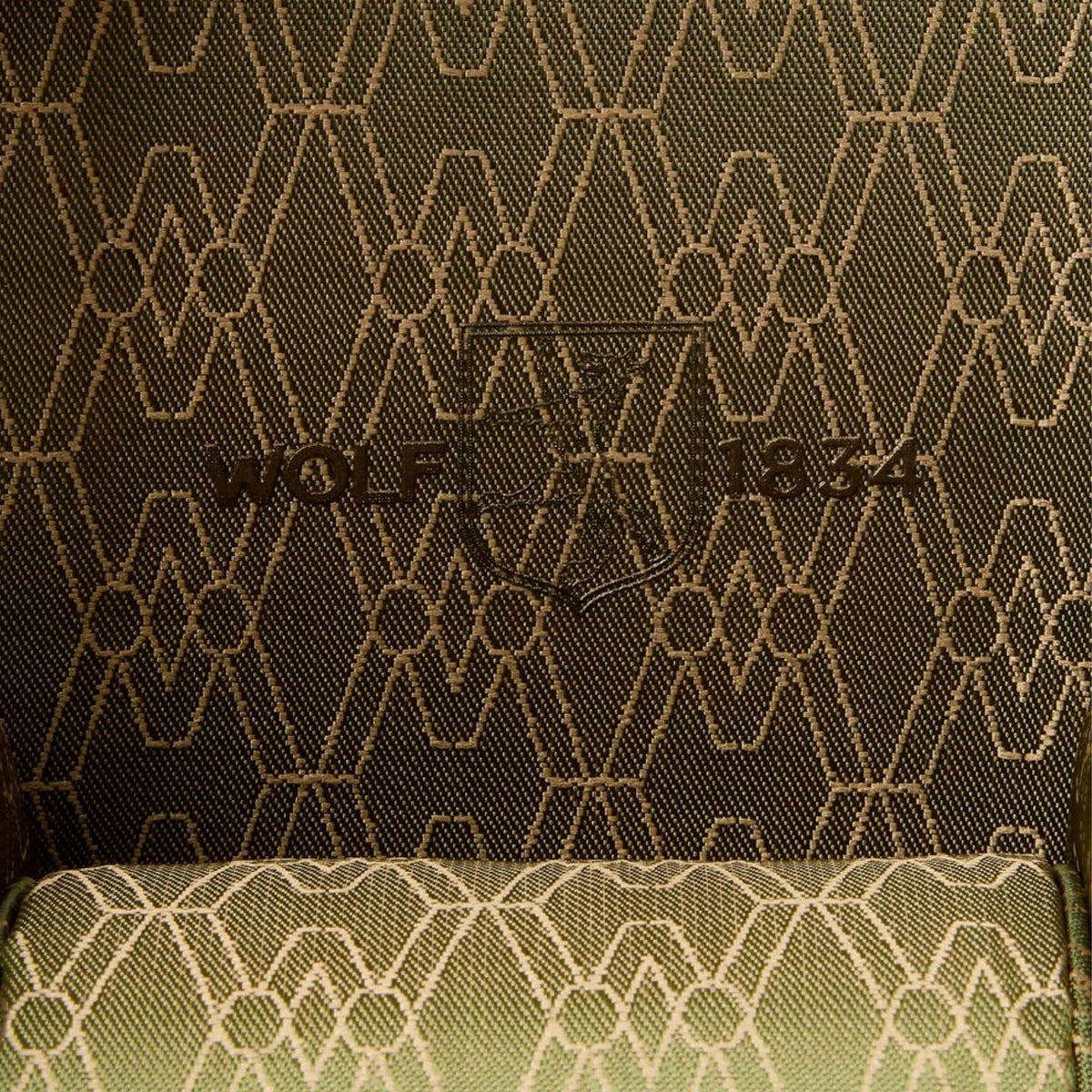 WOLF Earth 190th Anniversary 190641 close-up view of Jacquard patterned fabric interior lining and debossed crest logo