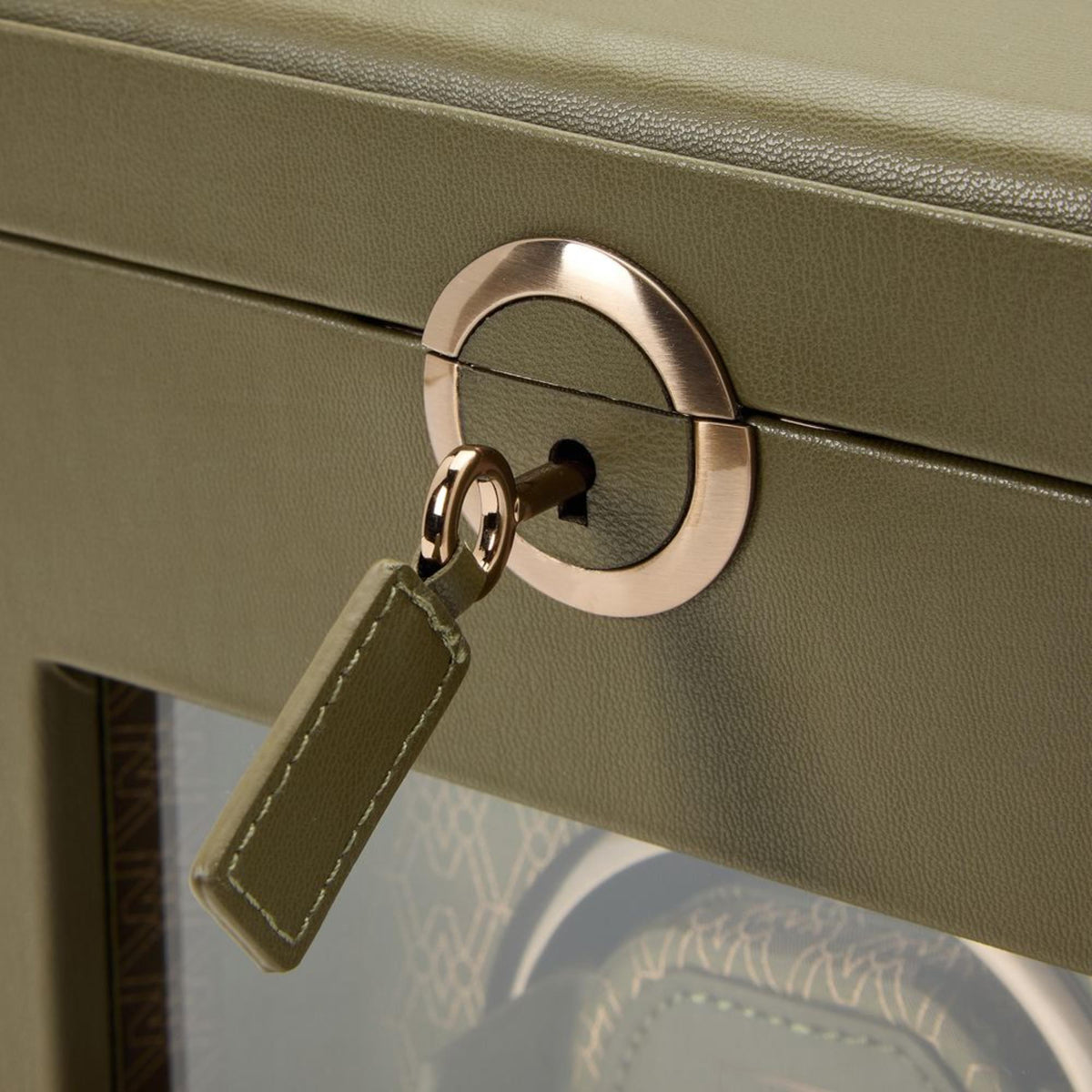 WOLF Earth 190th Anniversary 190341 macro detail shot of key with olive leather tag inserted into round lock