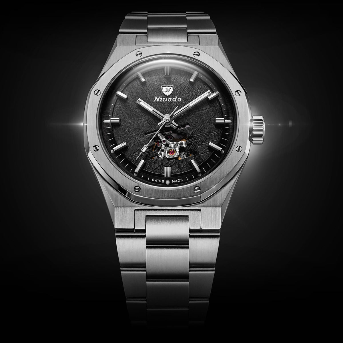 Nivada Grenchen F77 MK2 68052A77 straight face-on shot highlighting textured grey meteorite pattern and open heart balance wheel