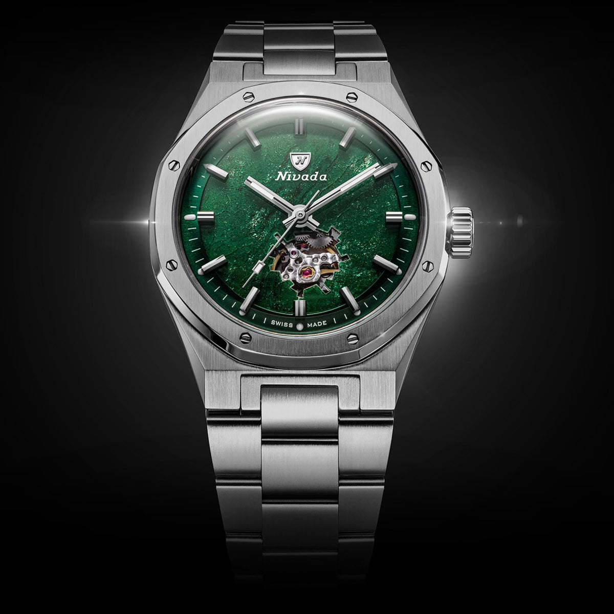 Nivada Grenchen F77 MK2 68051A77 straight face-on shot highlighting shimmering green aventurine pattern and open heart balance wheel
