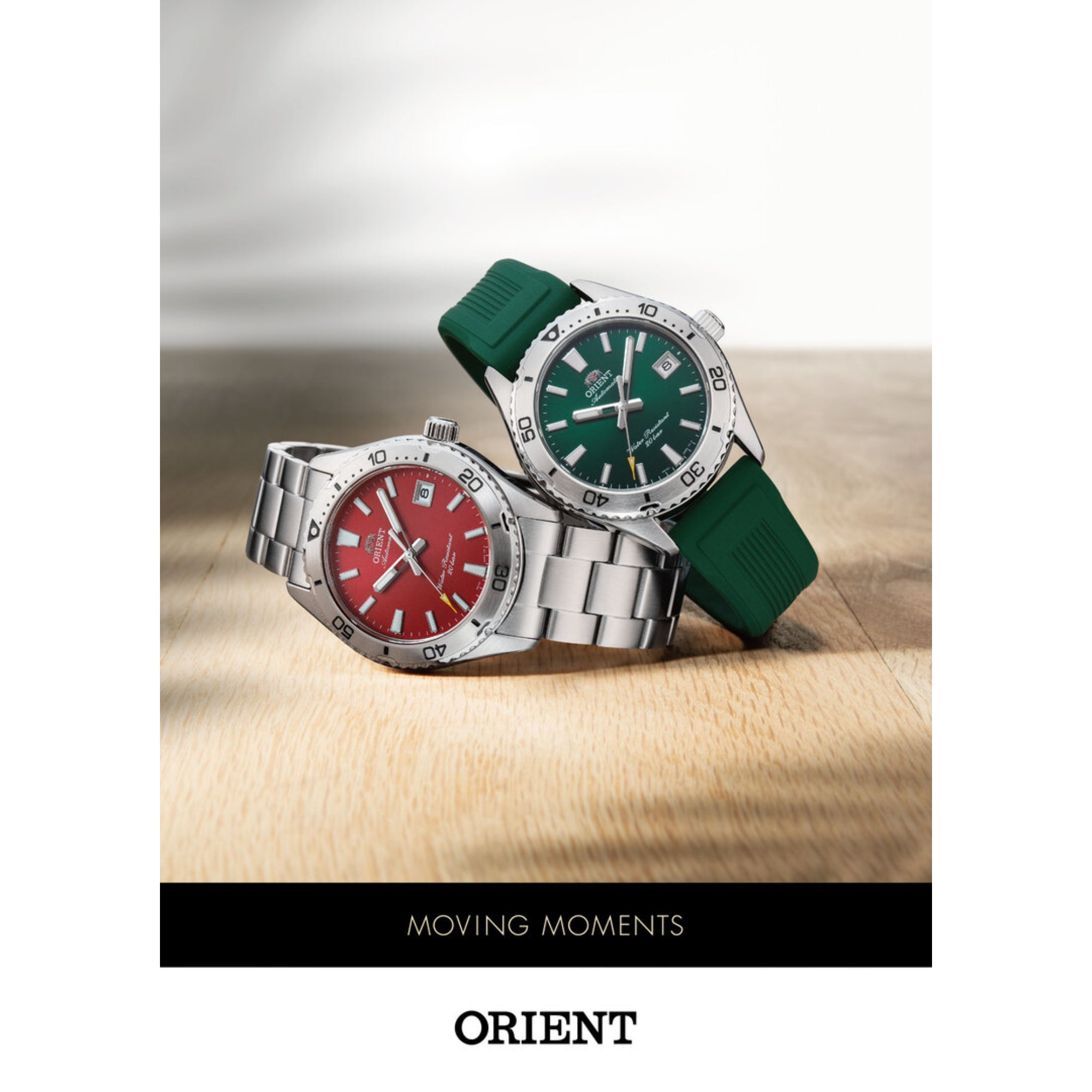 Orient Mako collection - Red and green dial automatic diver watches on wooden surface
