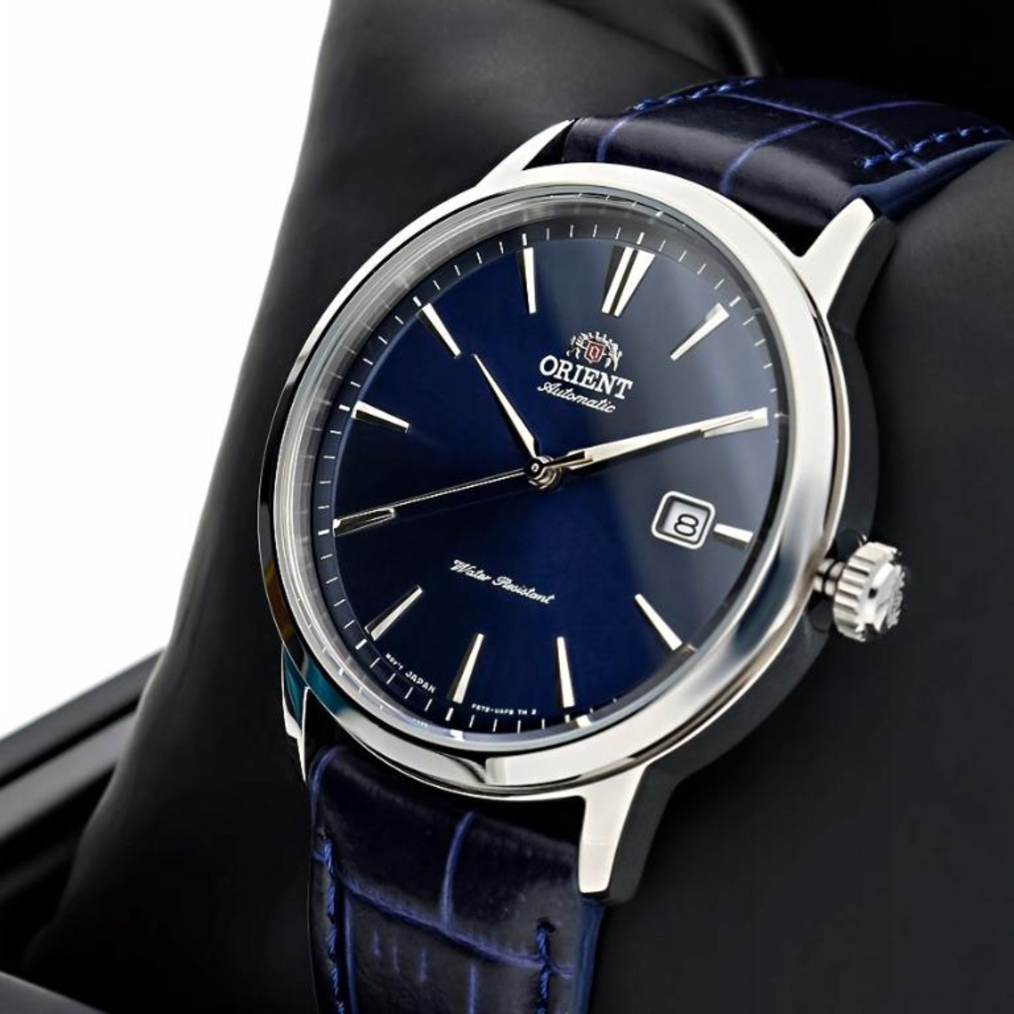 Close-up of an Orient Contemporary watch with a blue sunburst dial