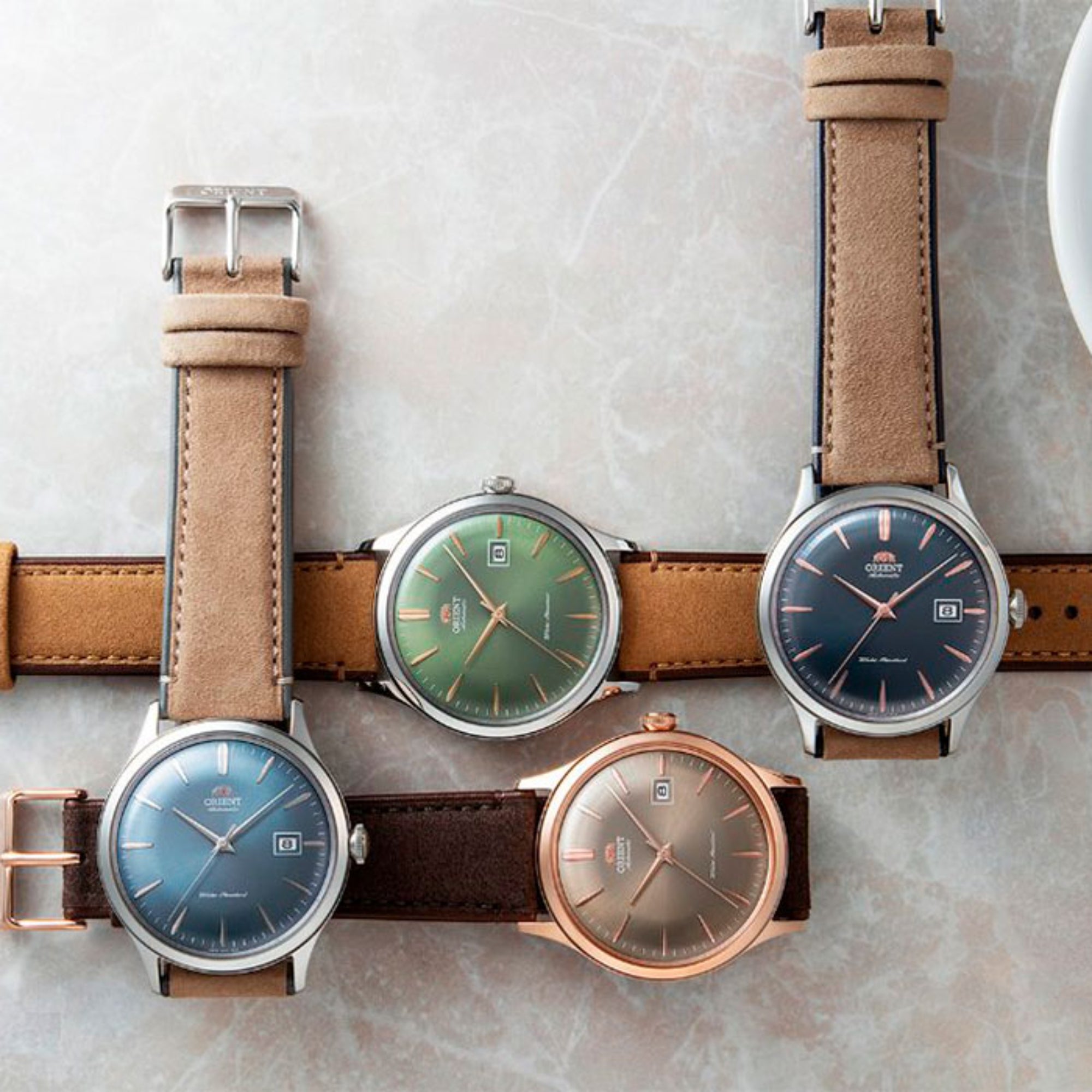 Orient Bambino collection of automatic dress watches with different dial colors