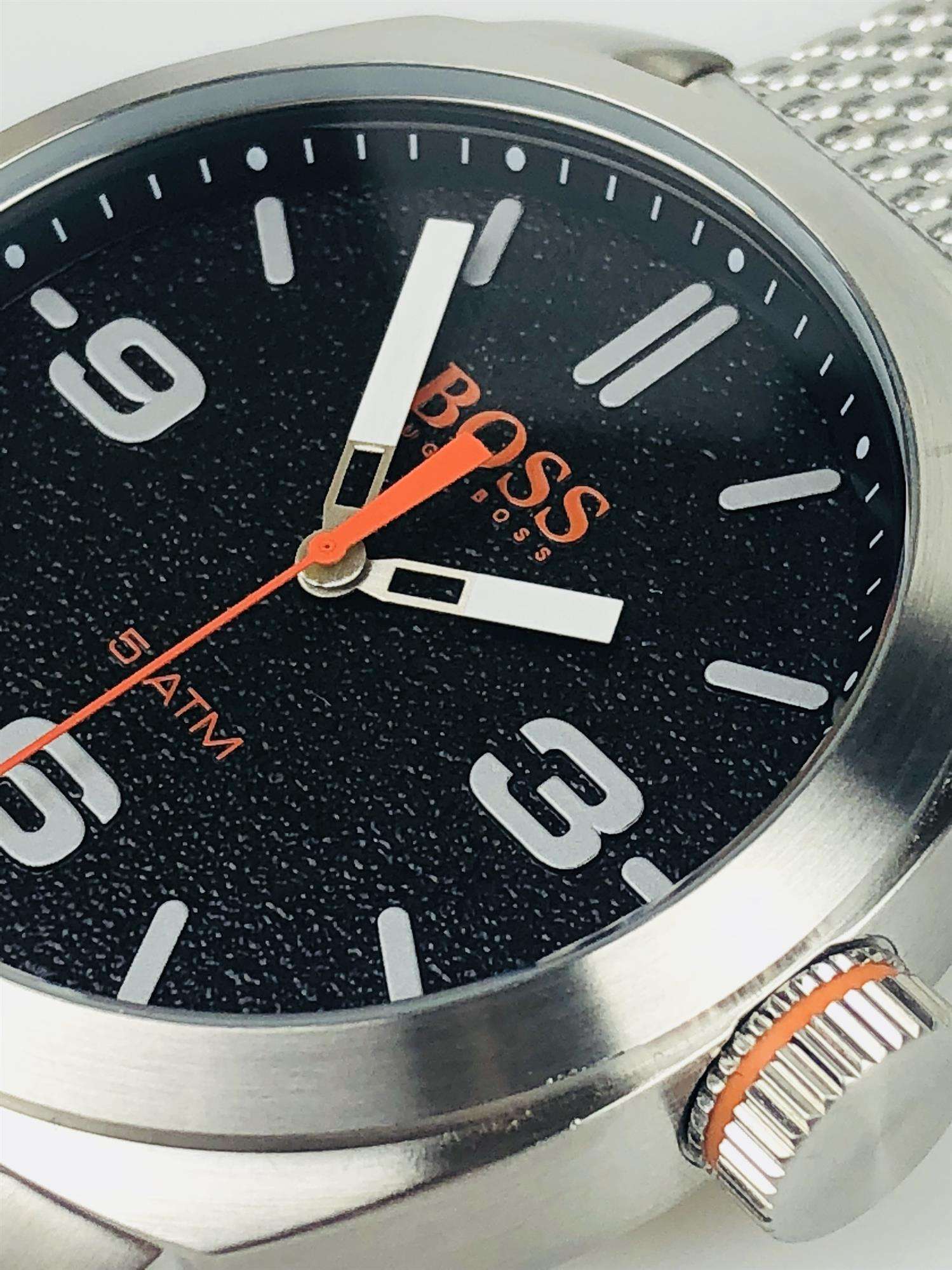 The Watch: Hugo Boss Orange Cape Town Stainless Steel Mesh Strap Stainless Steel Case Men’s Watch 1550013In a homage to the mountainous city from which it takes its name, this Hugo Boss Orange Cape Town Stainless Steel Men’s Watch (1550013) features a confident stainless steel mesh bracelet and case, with a sleek and contemporary dial design ensuring this sense of adventure is underpinned by the Hugo Boss design ethos.&nbsp;Key Features:Quartz MovementBlack DialStainless Steel Mesh BraceletWater Resistant t